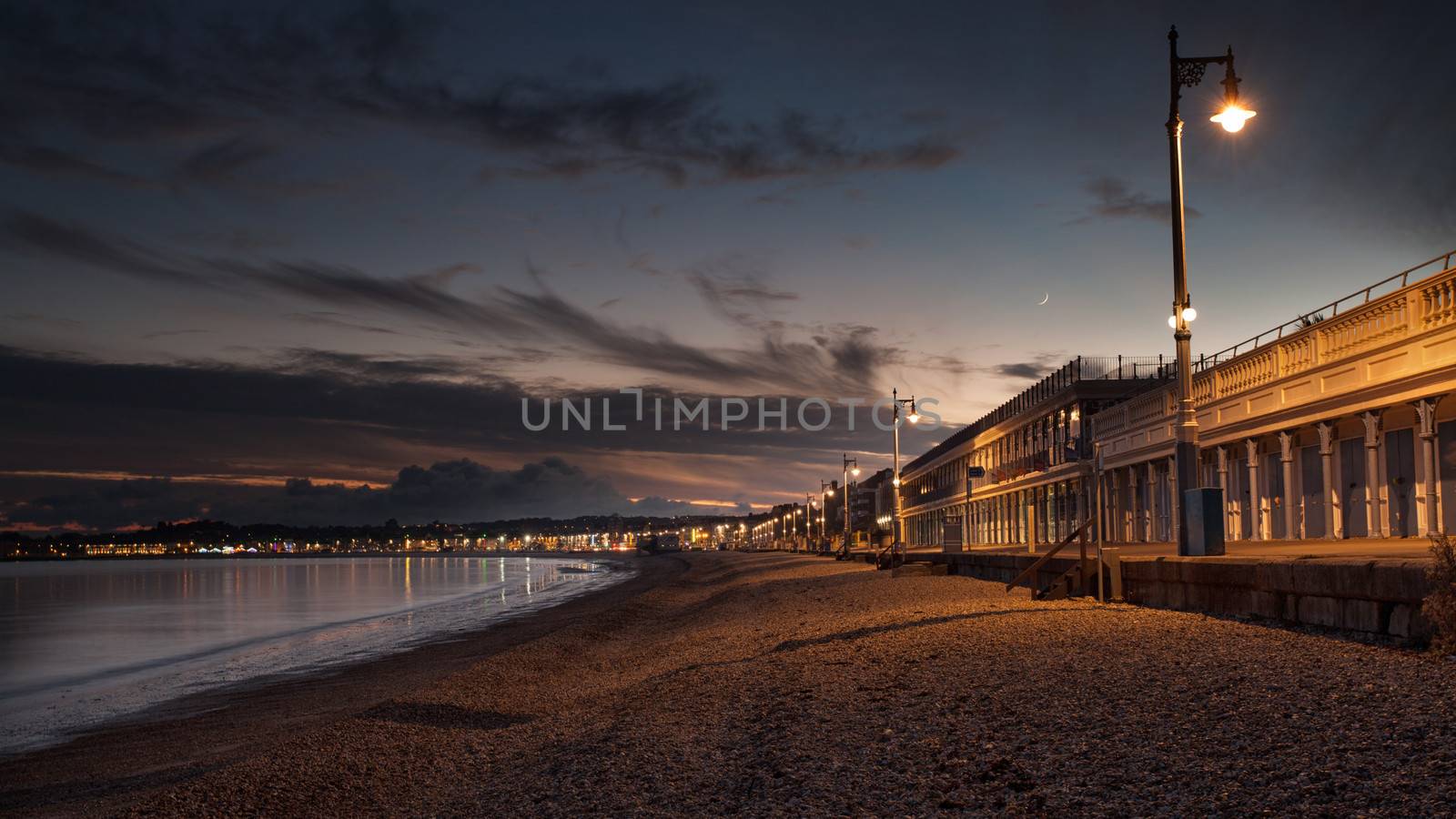 Traditional Seaside Victorian Beach Huts & Cafe Along the Sea Front