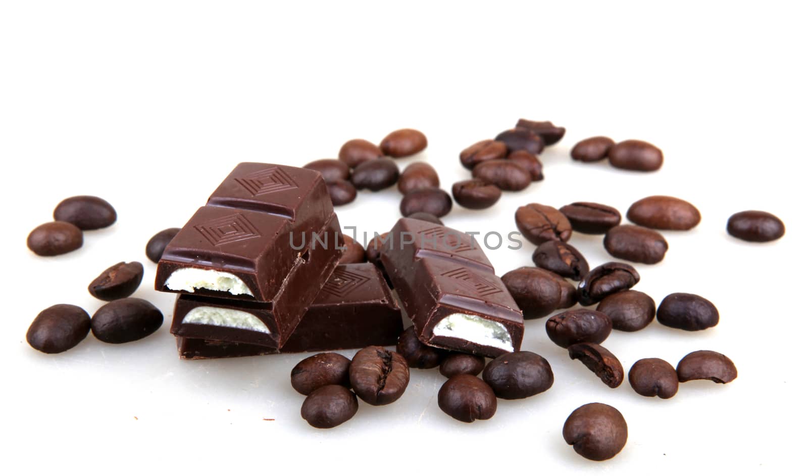 Chocolate And Coffee Isolated On White