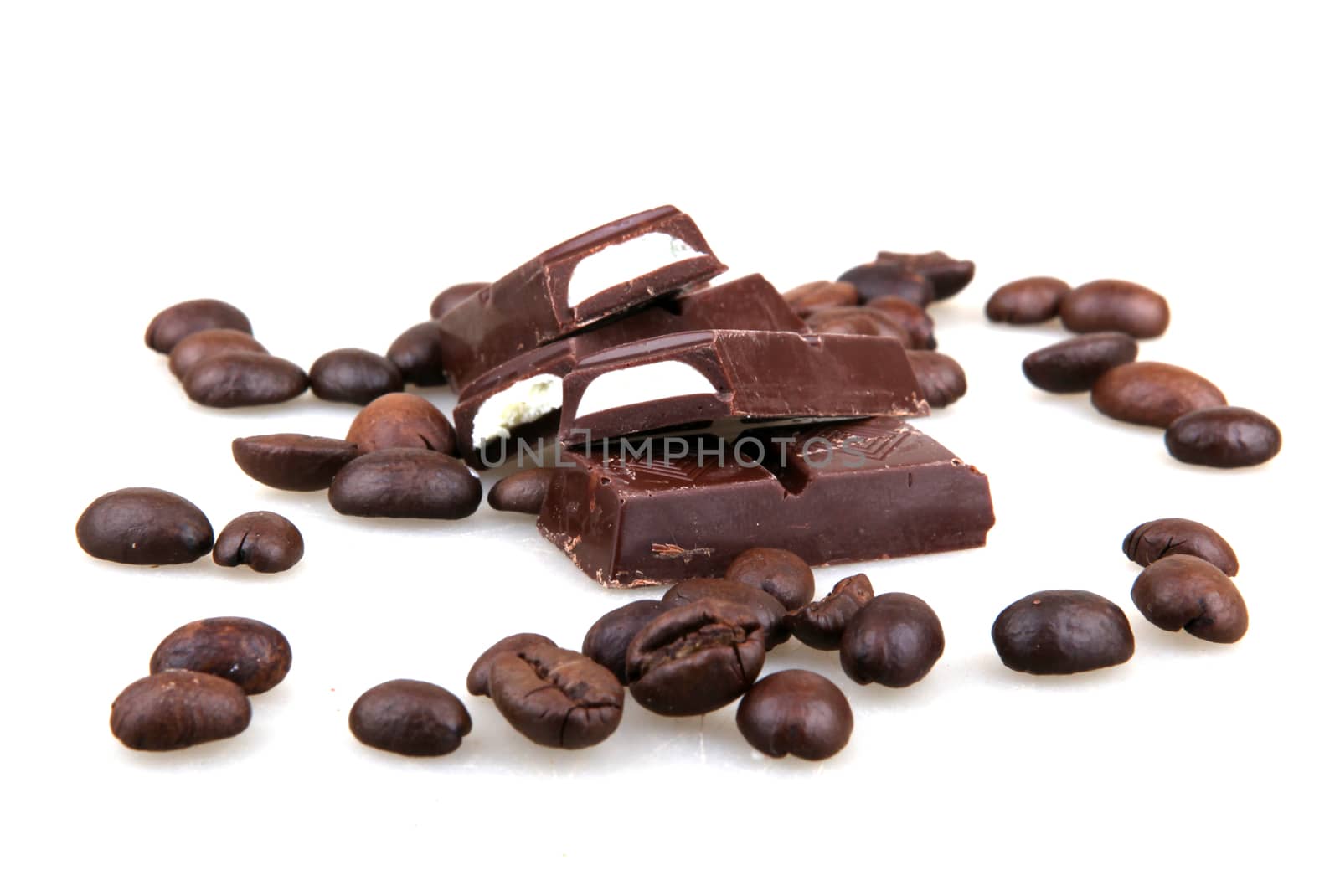 Chocolate And Coffee Isolated On White