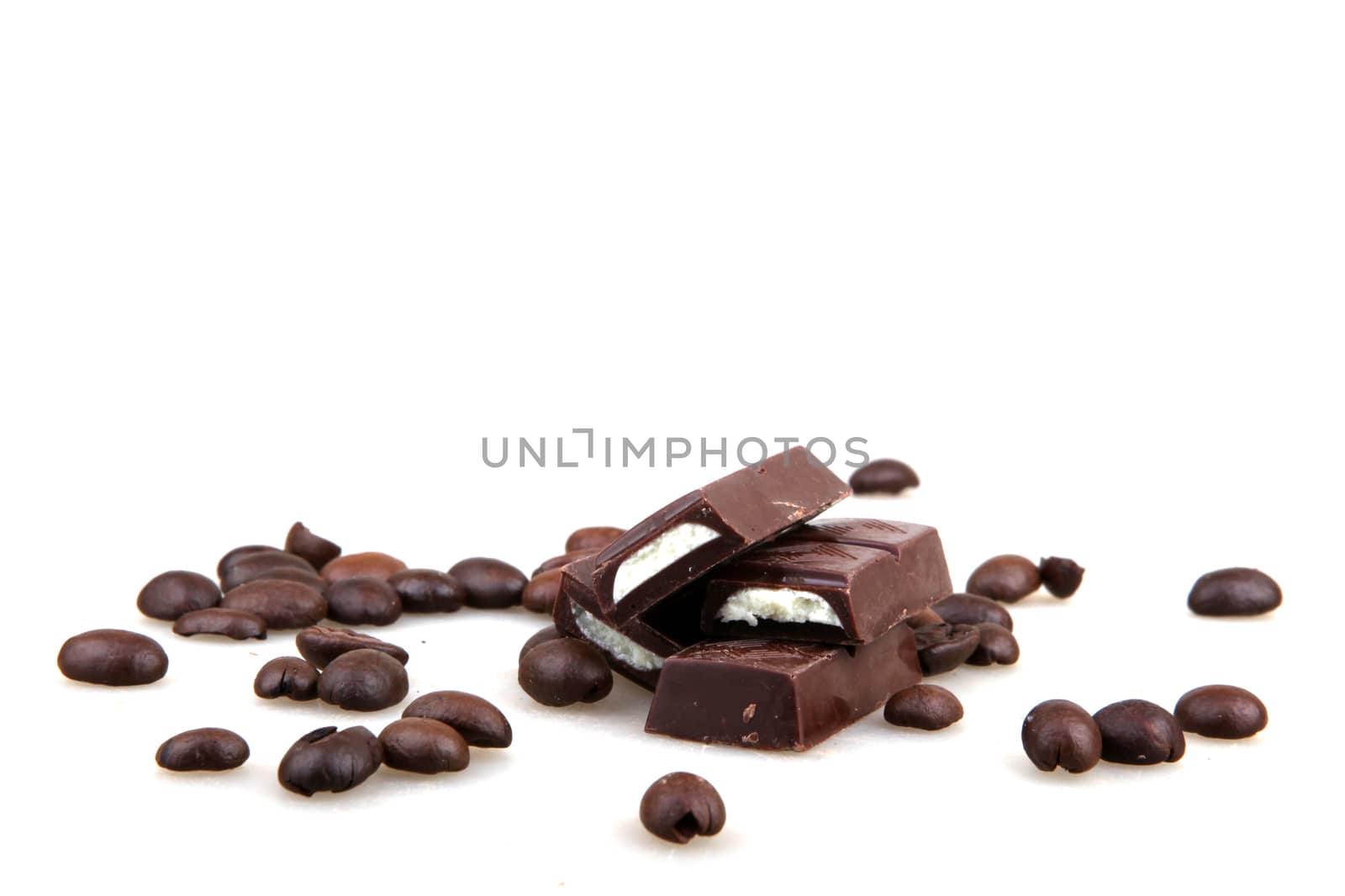 Chocolate And Coffee Isolated On White