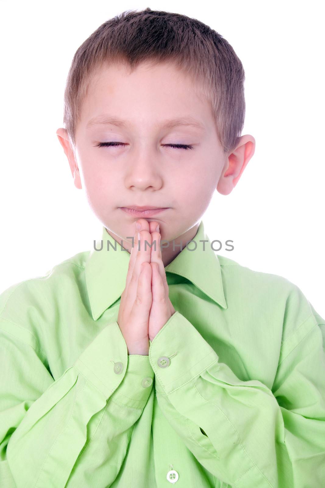 Christian Child praying isolated on white background