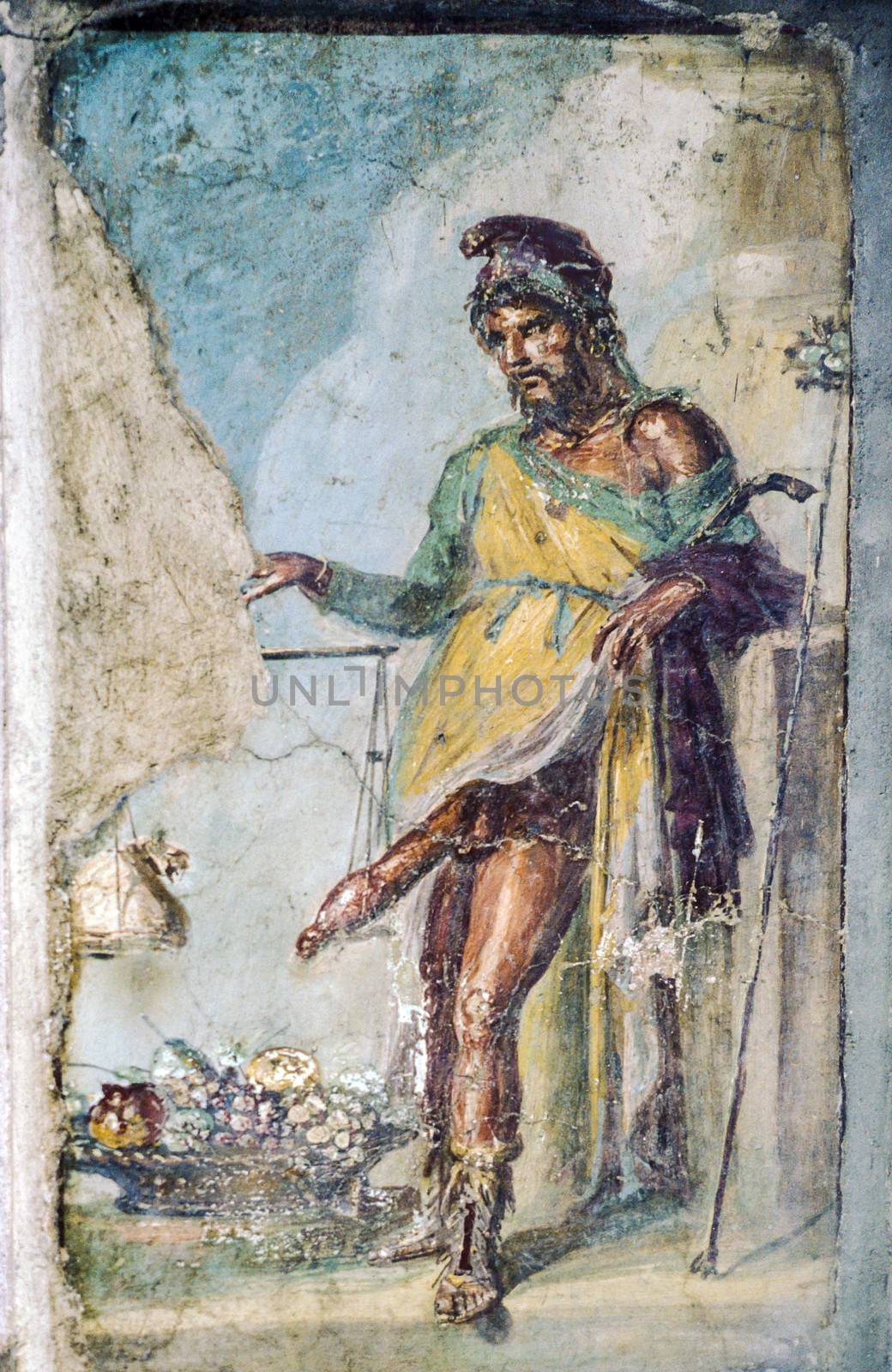 POMPEII, ITALY - NOVEMBER 30: Ancient roman fresco of the roman god of fertility and lust Priapus on Nov 30, 1996 in Pompeii, Italy.