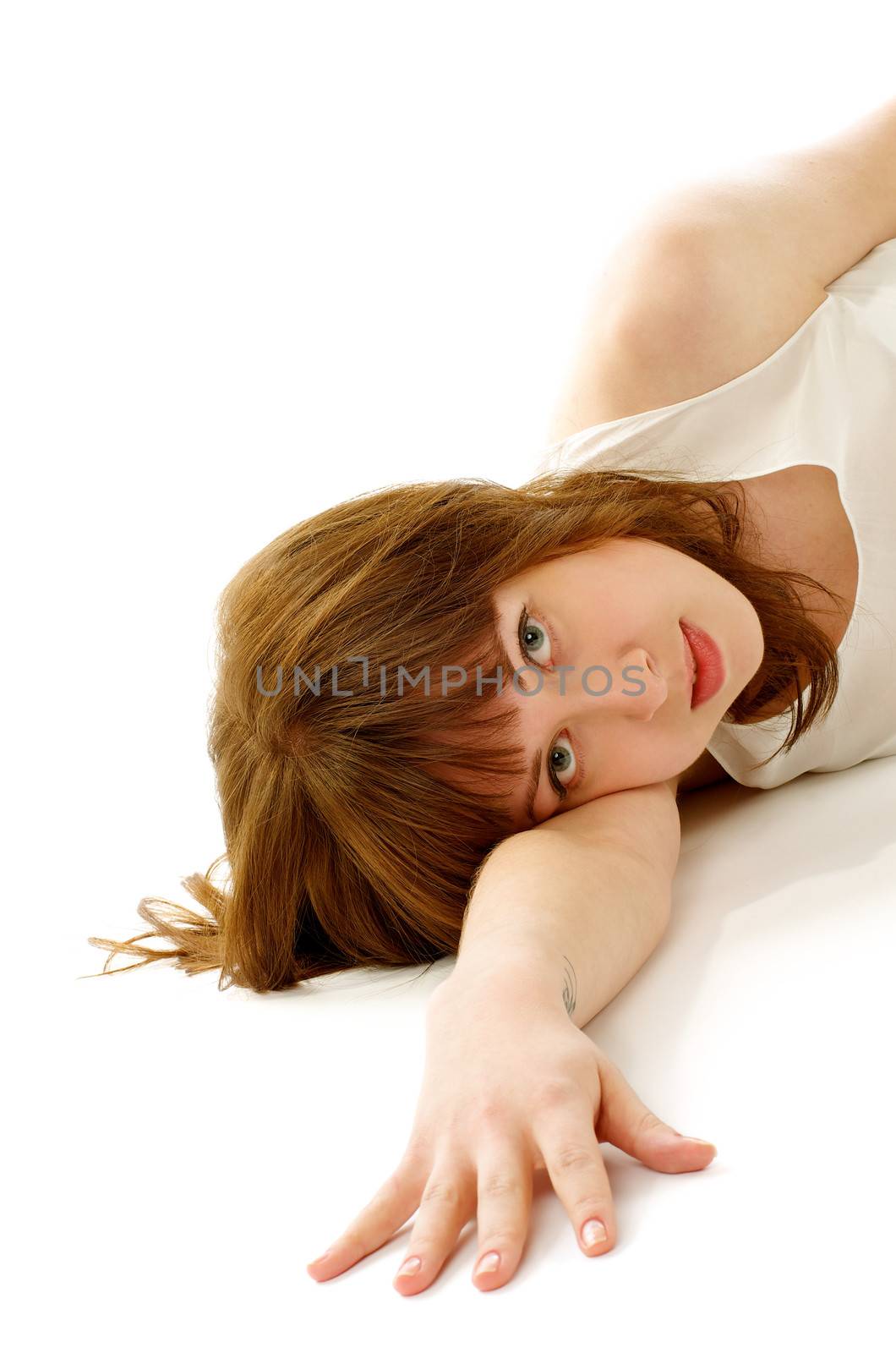 Young Attractive Woman Lying Down and Drawing Out her Hand