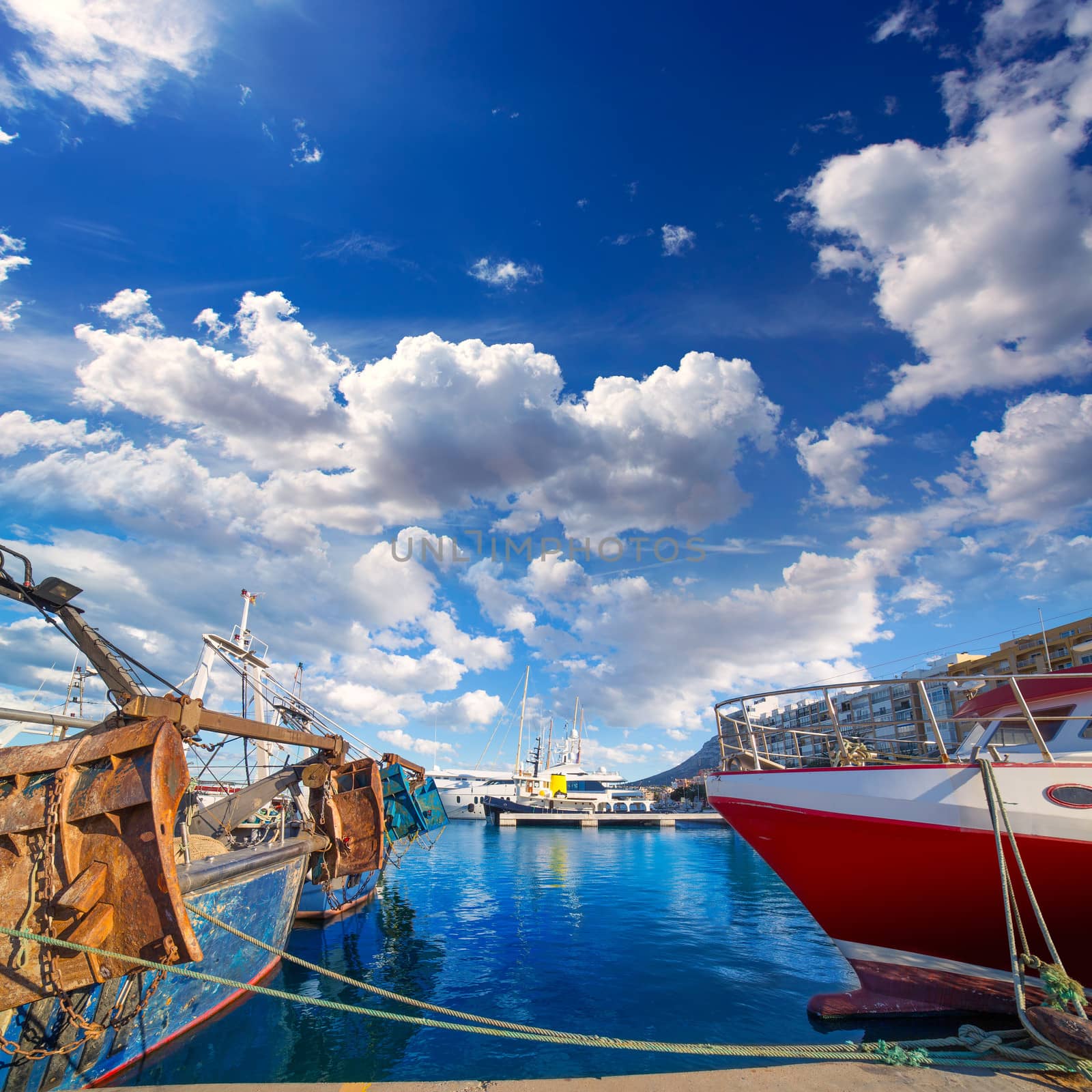 Denia Alicante port with blue summer sky in Spain by lunamarina