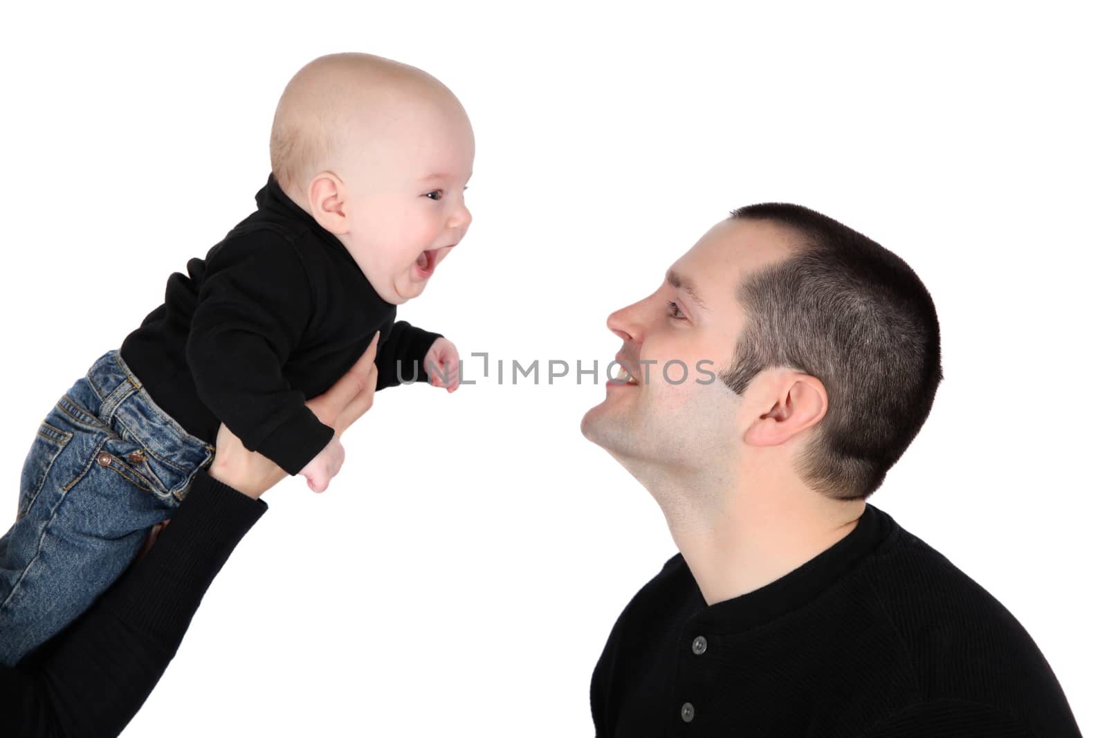 Baby boy and his dad against white background