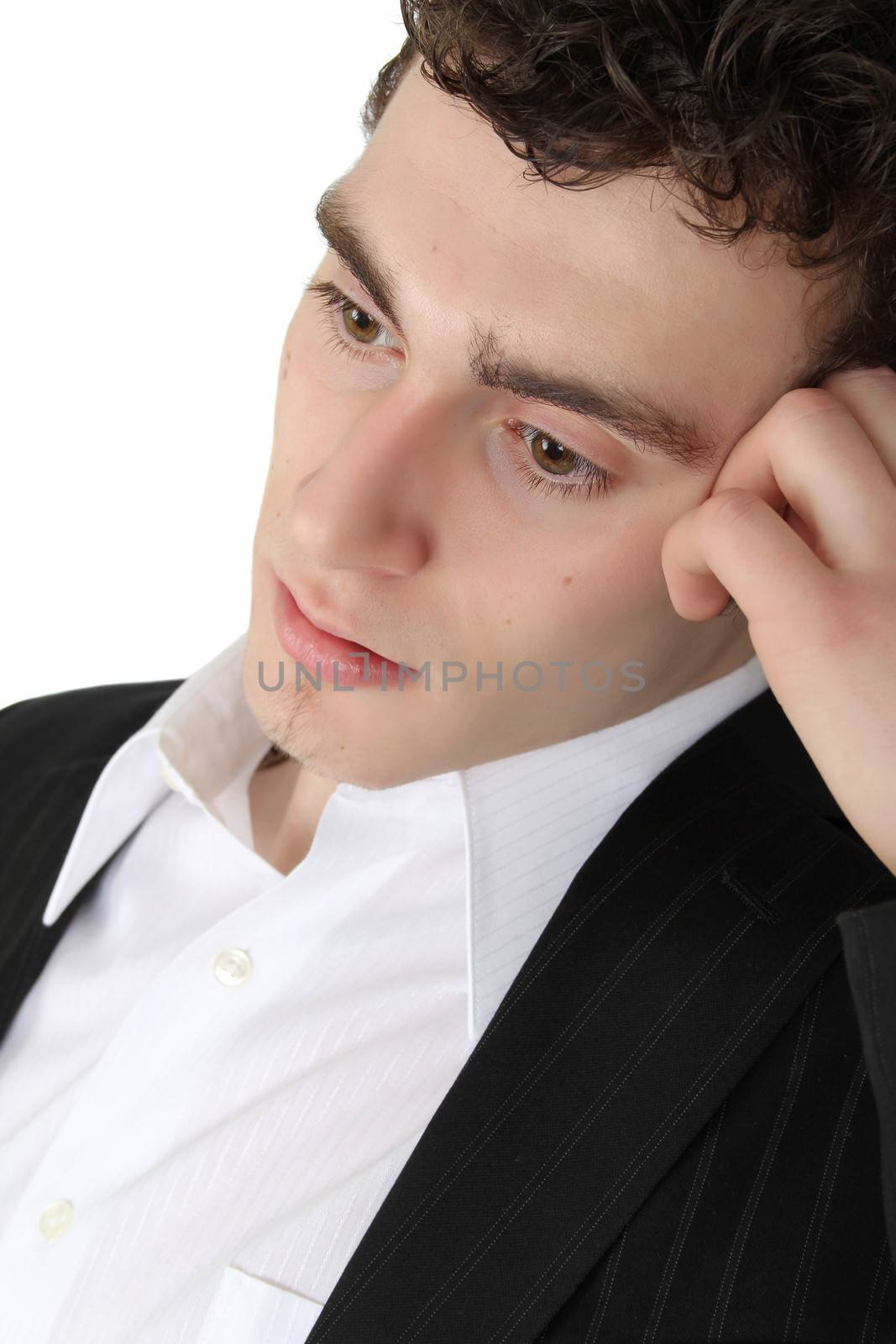 Attractive brunette male in suit with white shirt