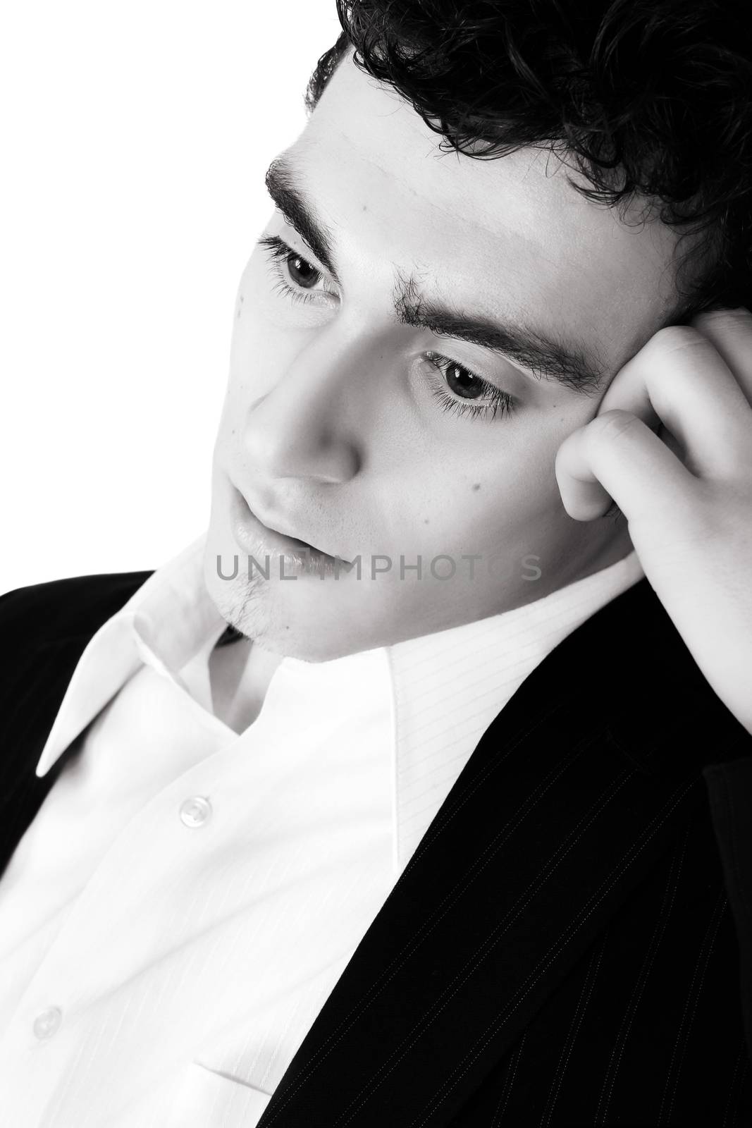 Attractive brunette male in suit with white shirt