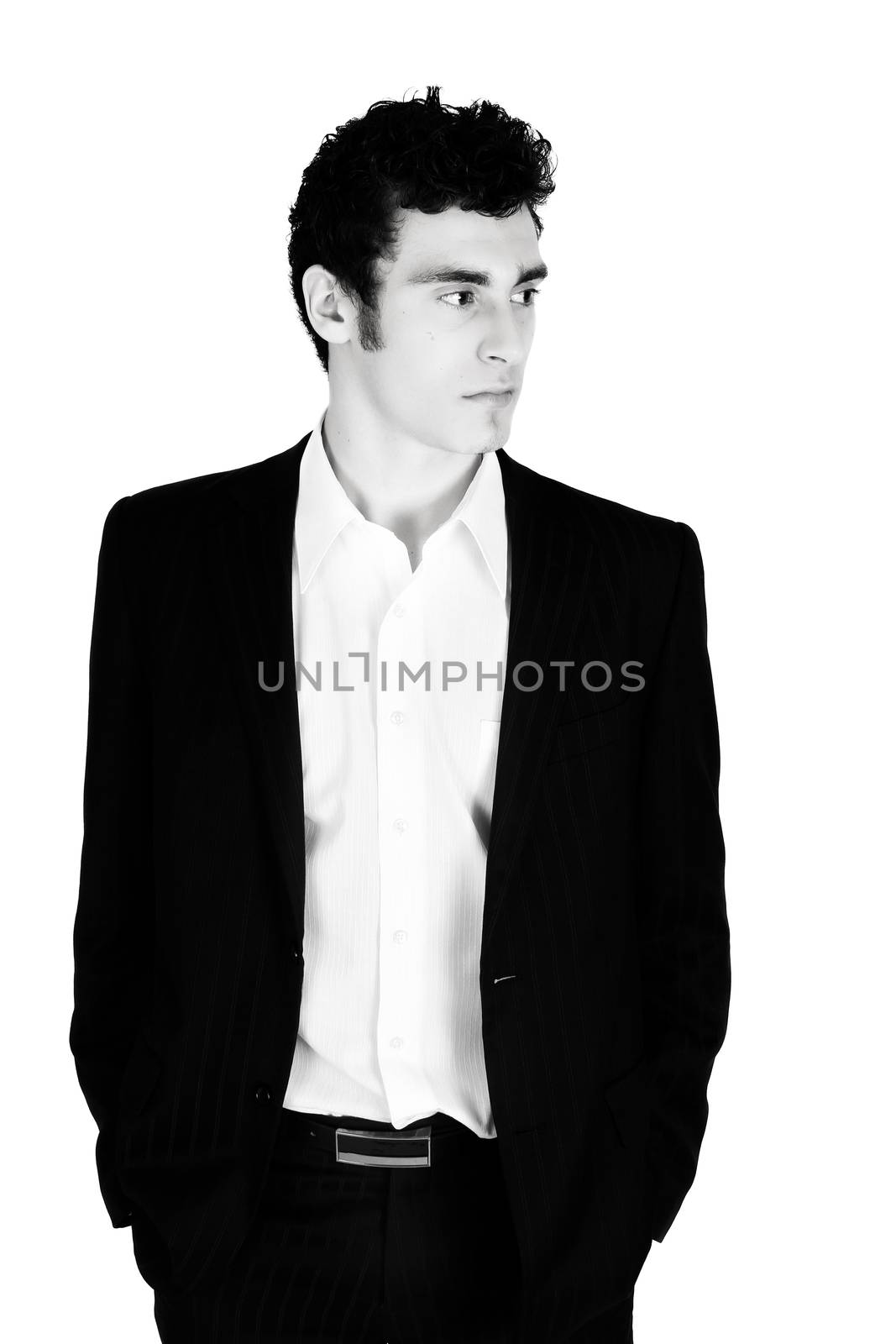 Attractive brunette male in suit with white shirt 