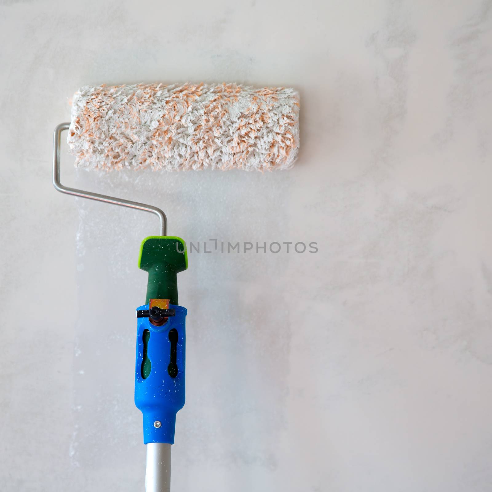 Paint roller for painting wall after plastering by lunamarina