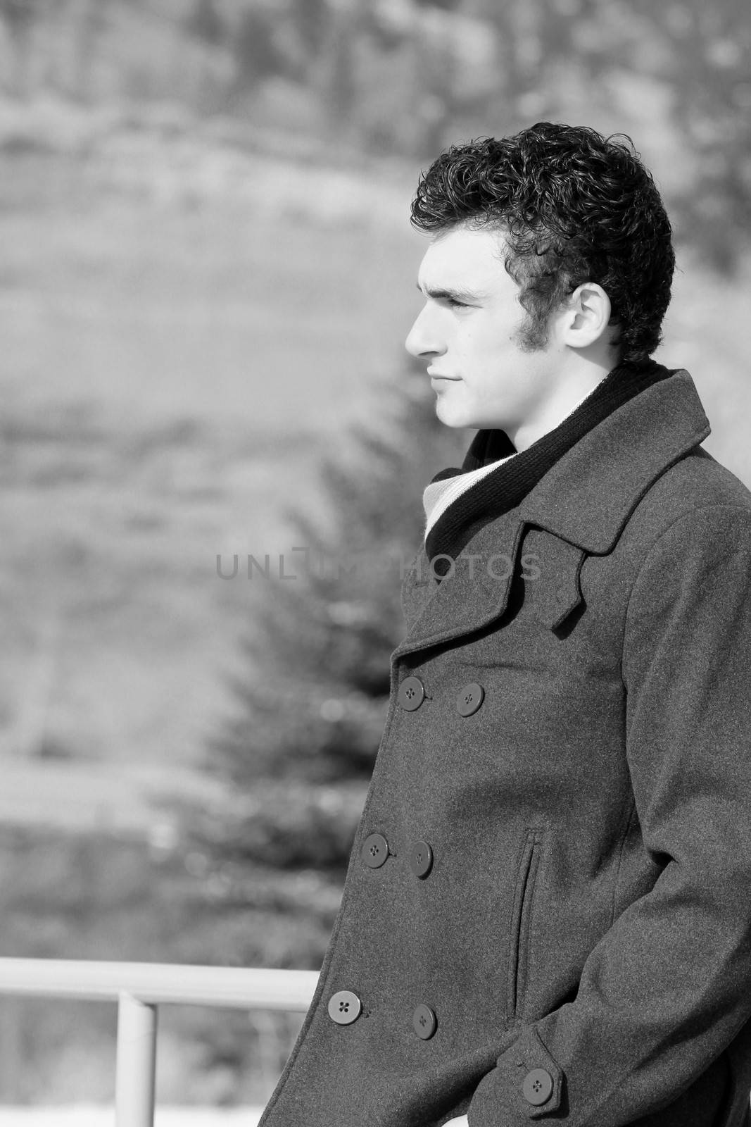 Attractive brunette male outside on a cold winters day