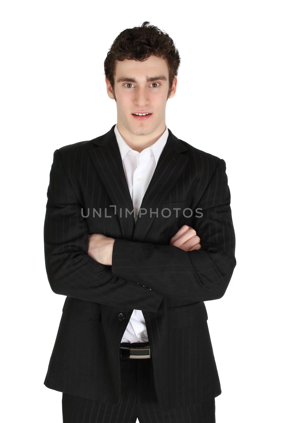 Attractive brunette male model wearing a suit against white