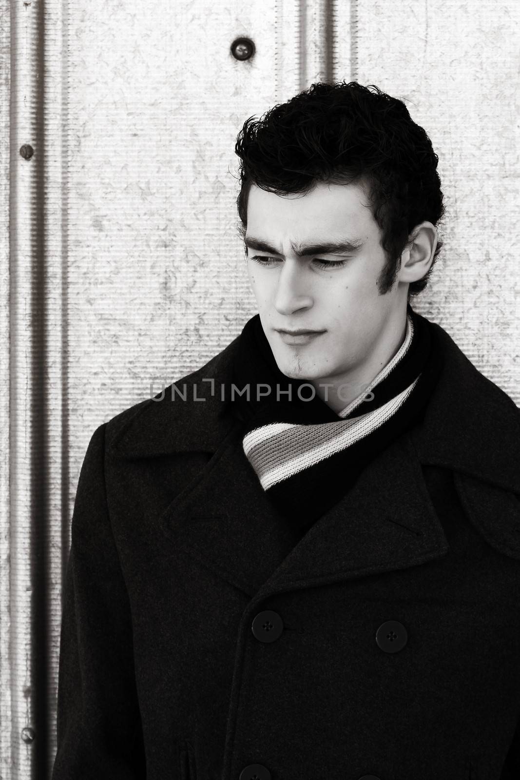 Attractive brunette male outside on a cold winters day