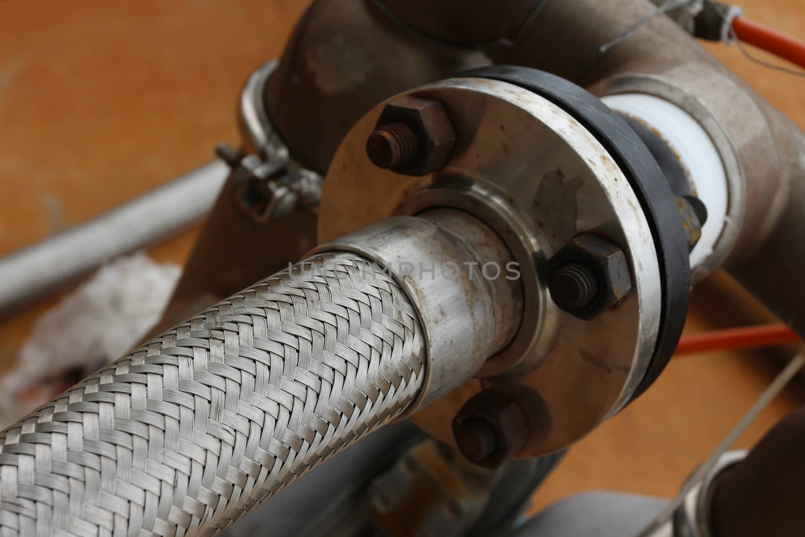 Close-up of Flexible hose with steel pipe line
