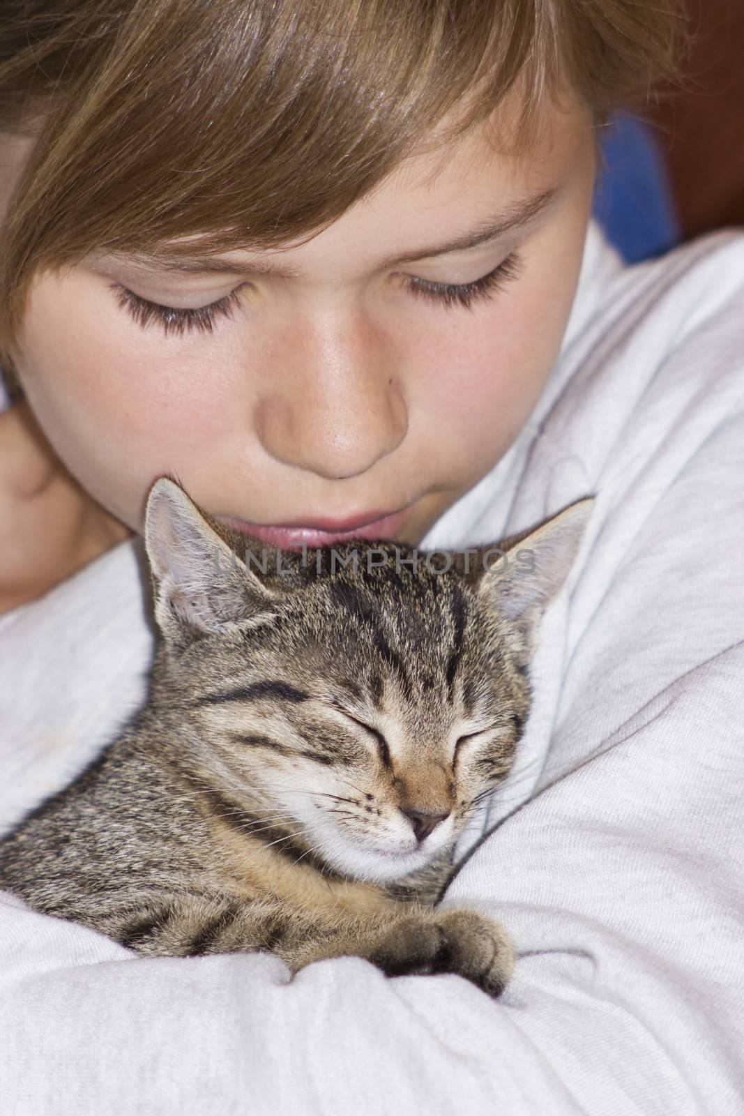  child with kitten  by miradrozdowski