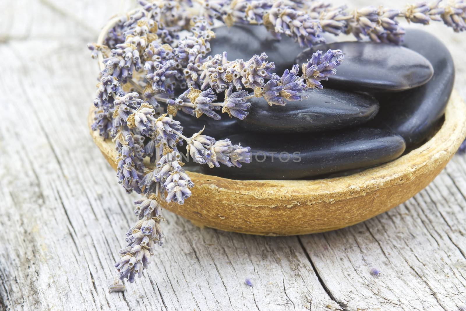 massage stones and dried lavender