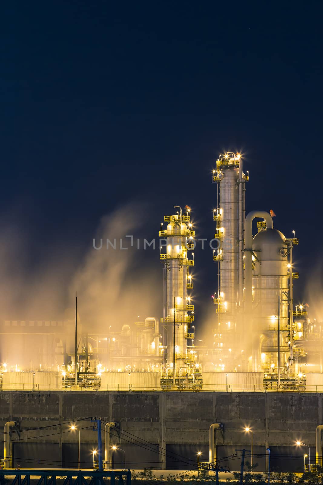 Steam vapour from the cooling fan in the chemical industry factory