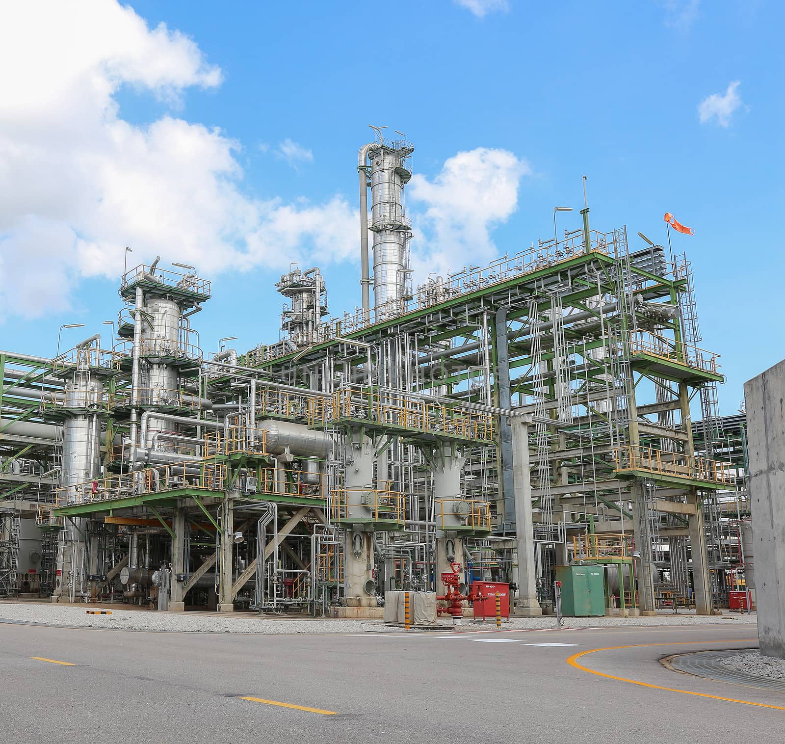 Chemical refinery tower in sunny day