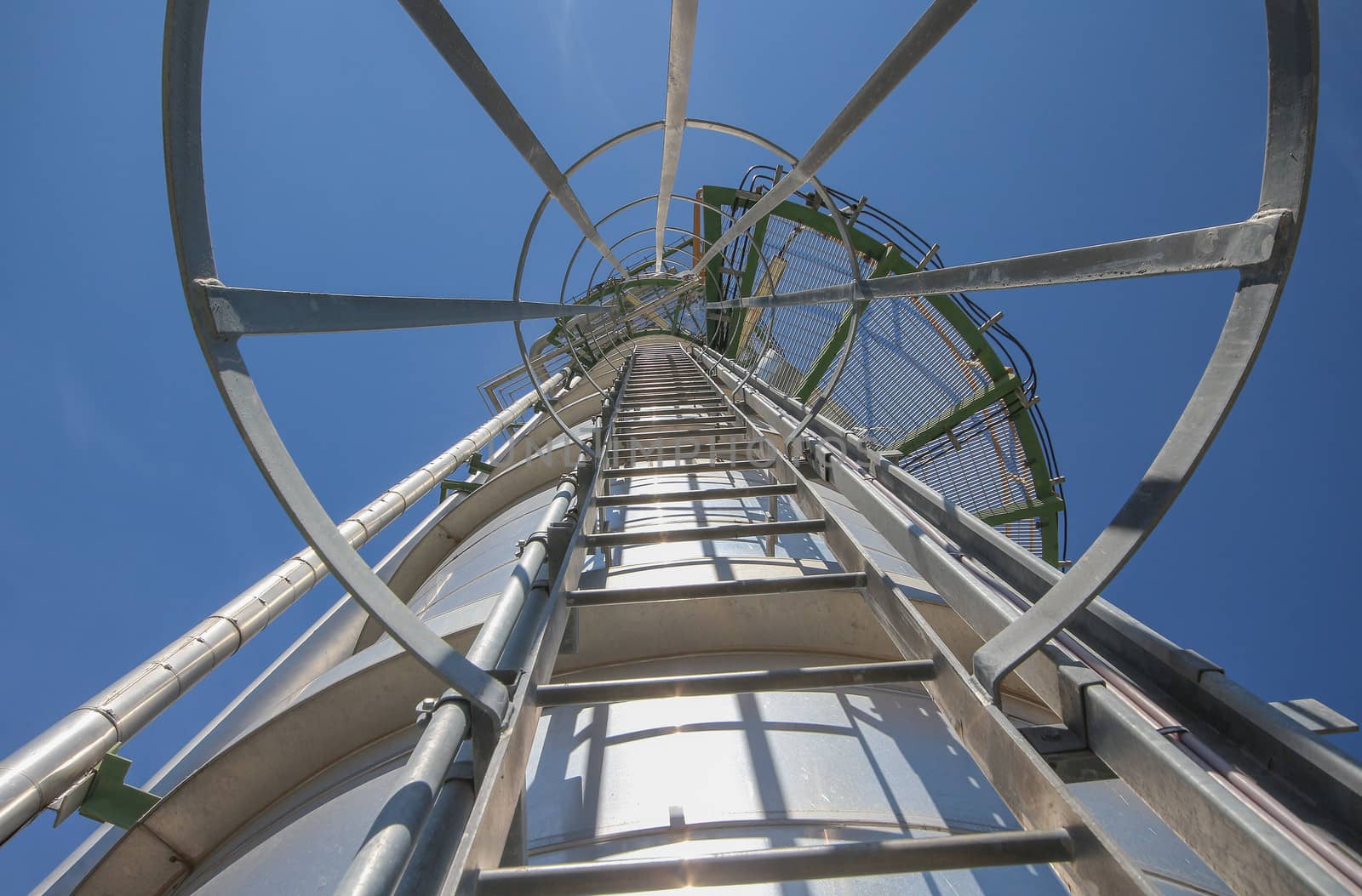 stairway with refinery tower in chemical plant