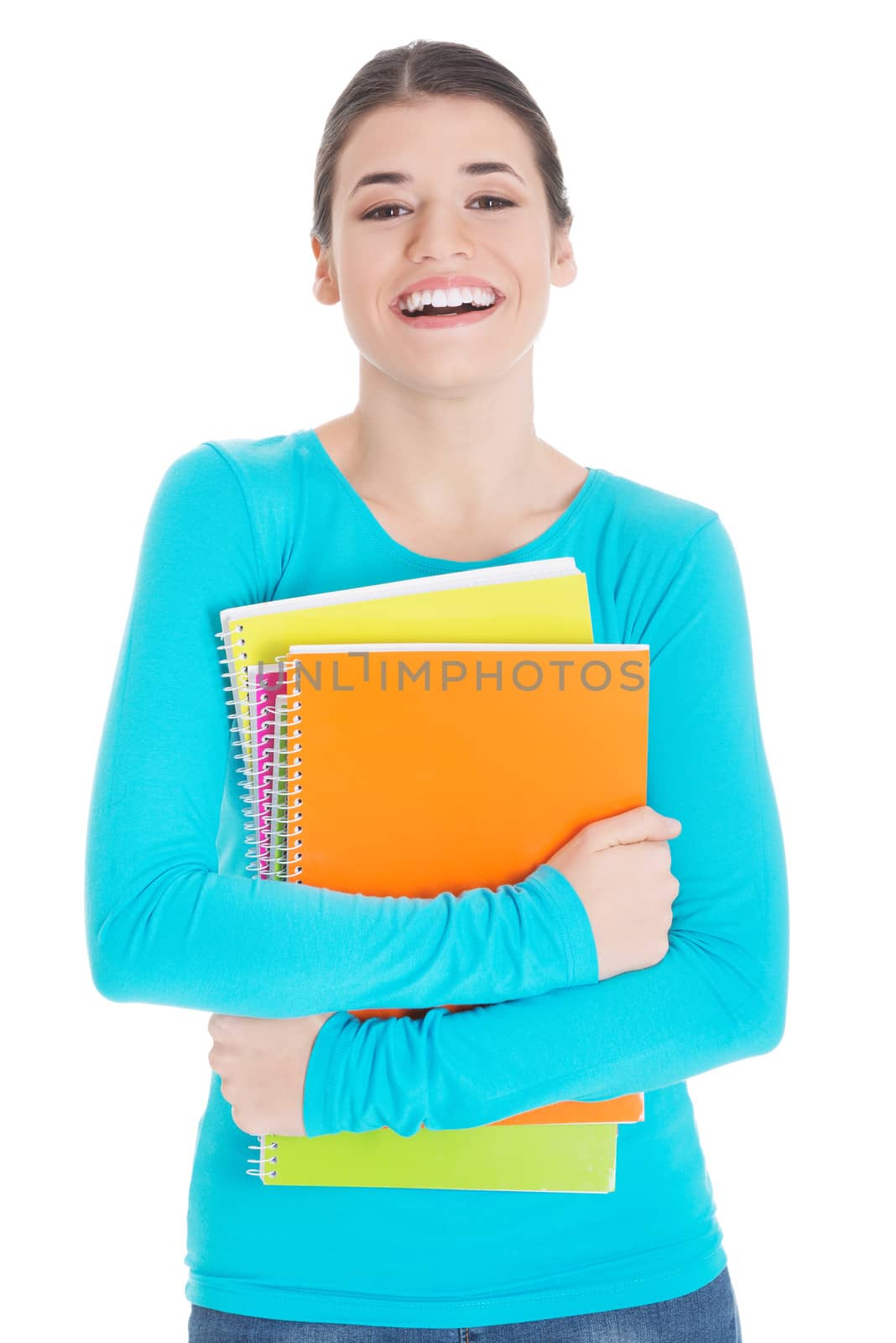 Beautiful young woman student with workbook. by BDS