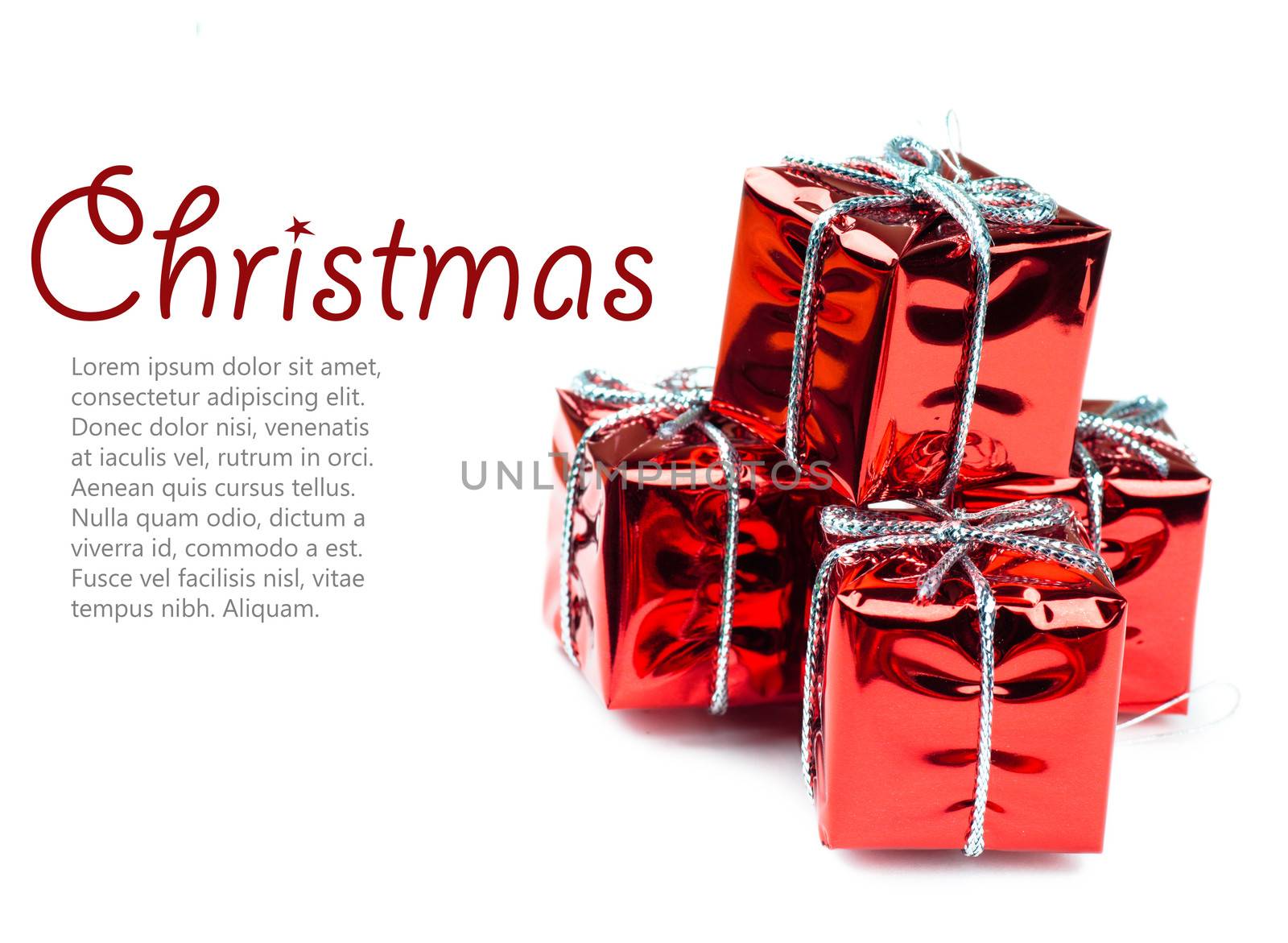 Closeup view of vibrant red christmas decorations in shape of gift boxes