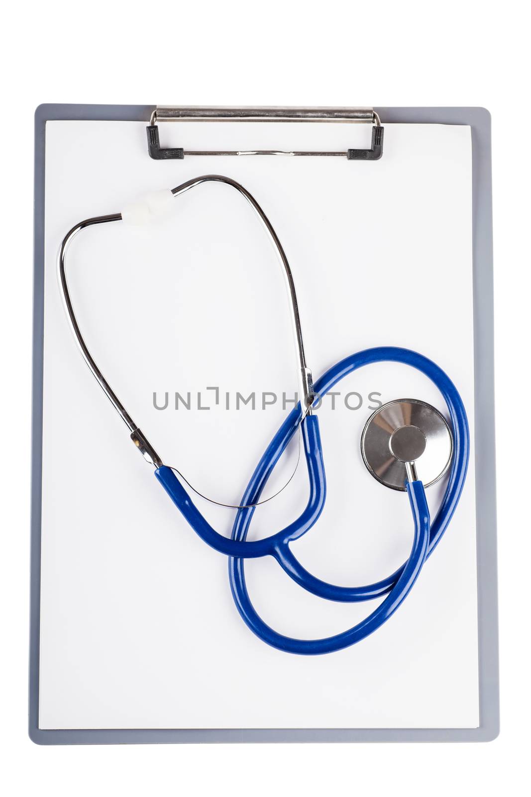 Blank sheet and stethoscope over white background