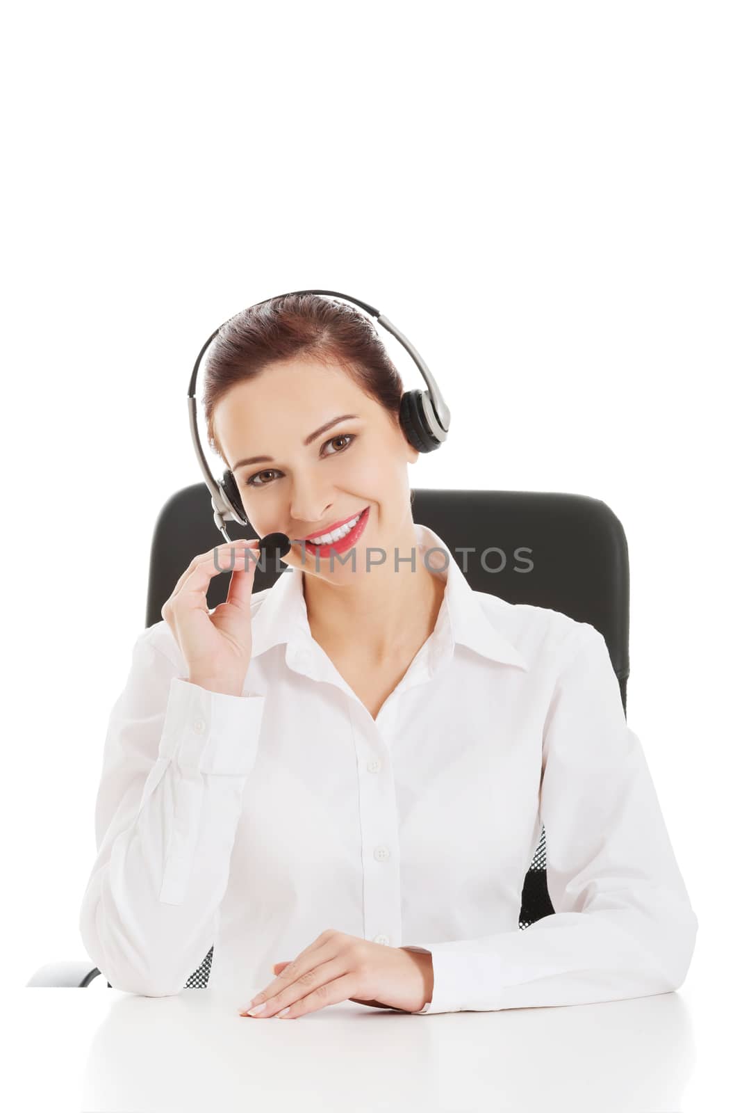 Beautiful woman sitting with microphone and headphones. by BDS