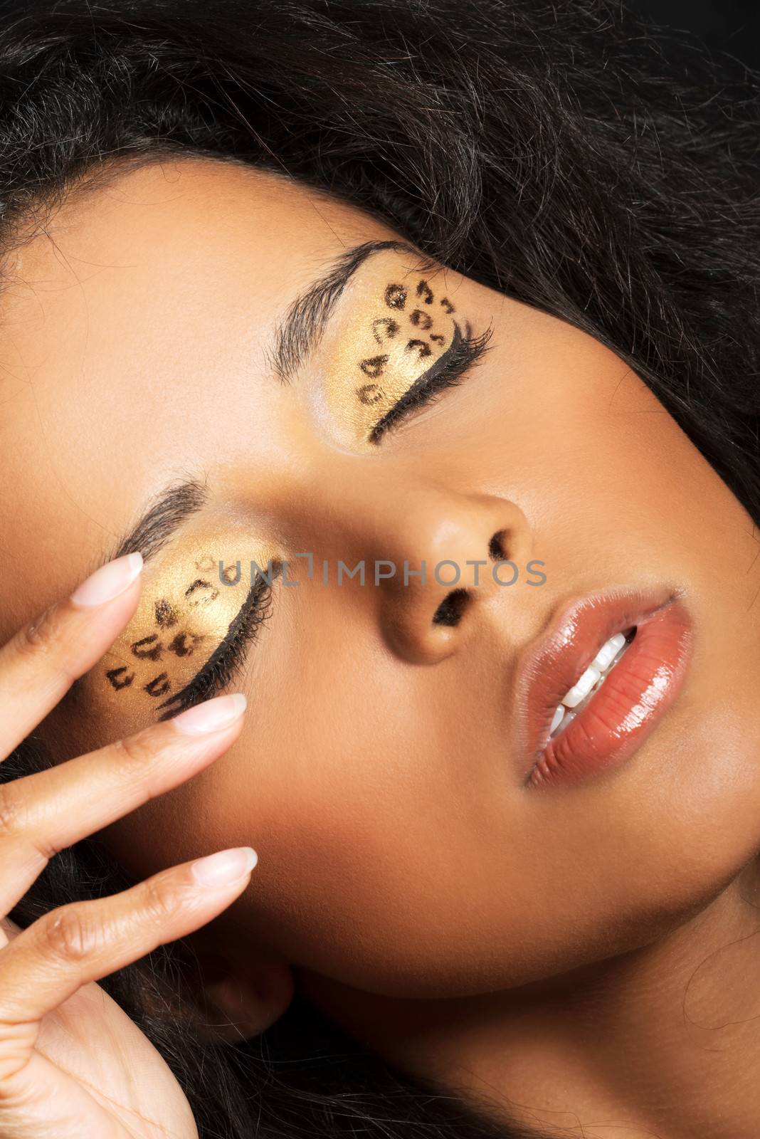 Close up on beautiful tiger make-up. by BDS