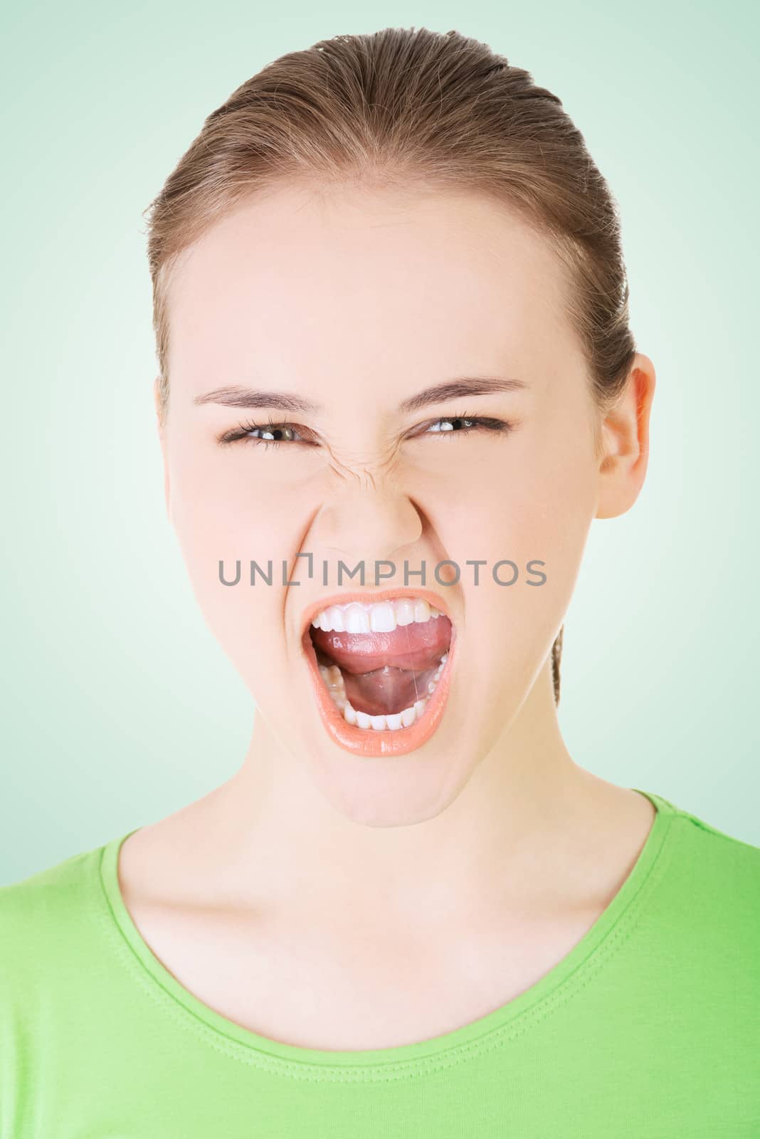 Youngwoman screaming with anger by BDS