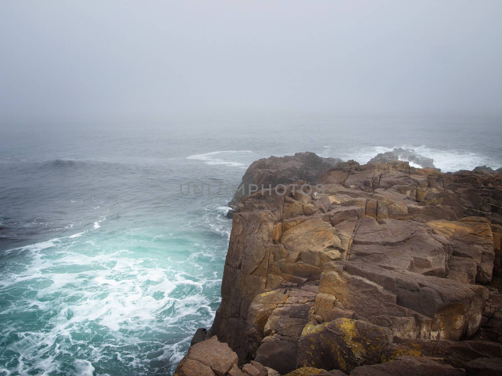 Storm Sea With Dark Rocks in Bad Weather Time