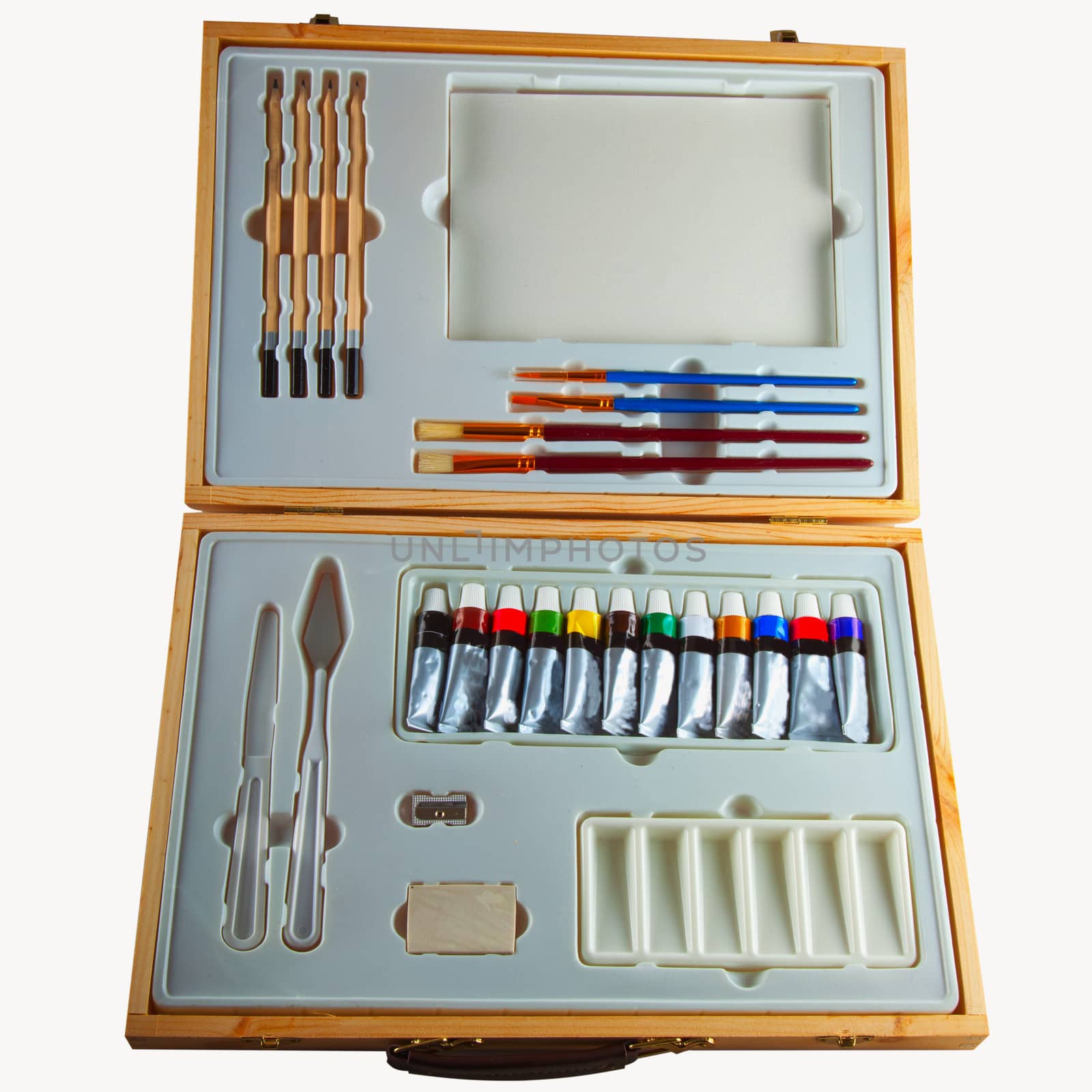 Wooden case with painting instruments isolated over white