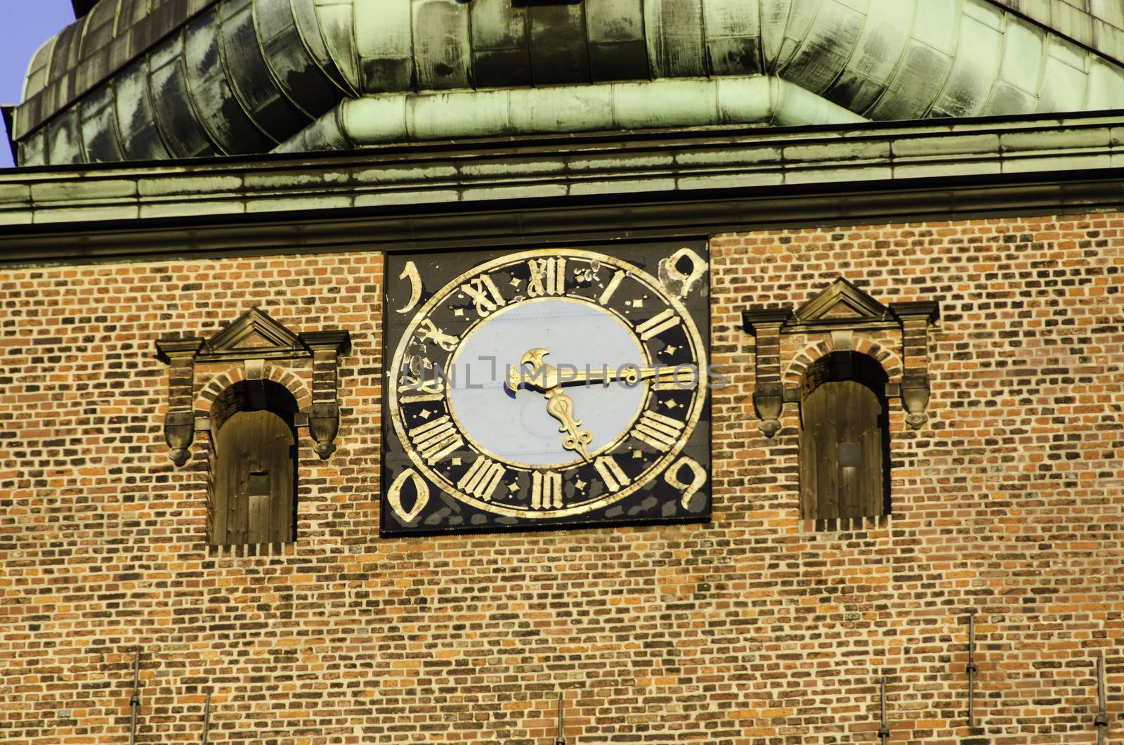 The big church clock of sankt Nikolaj Church in Copenhagen, Denmark