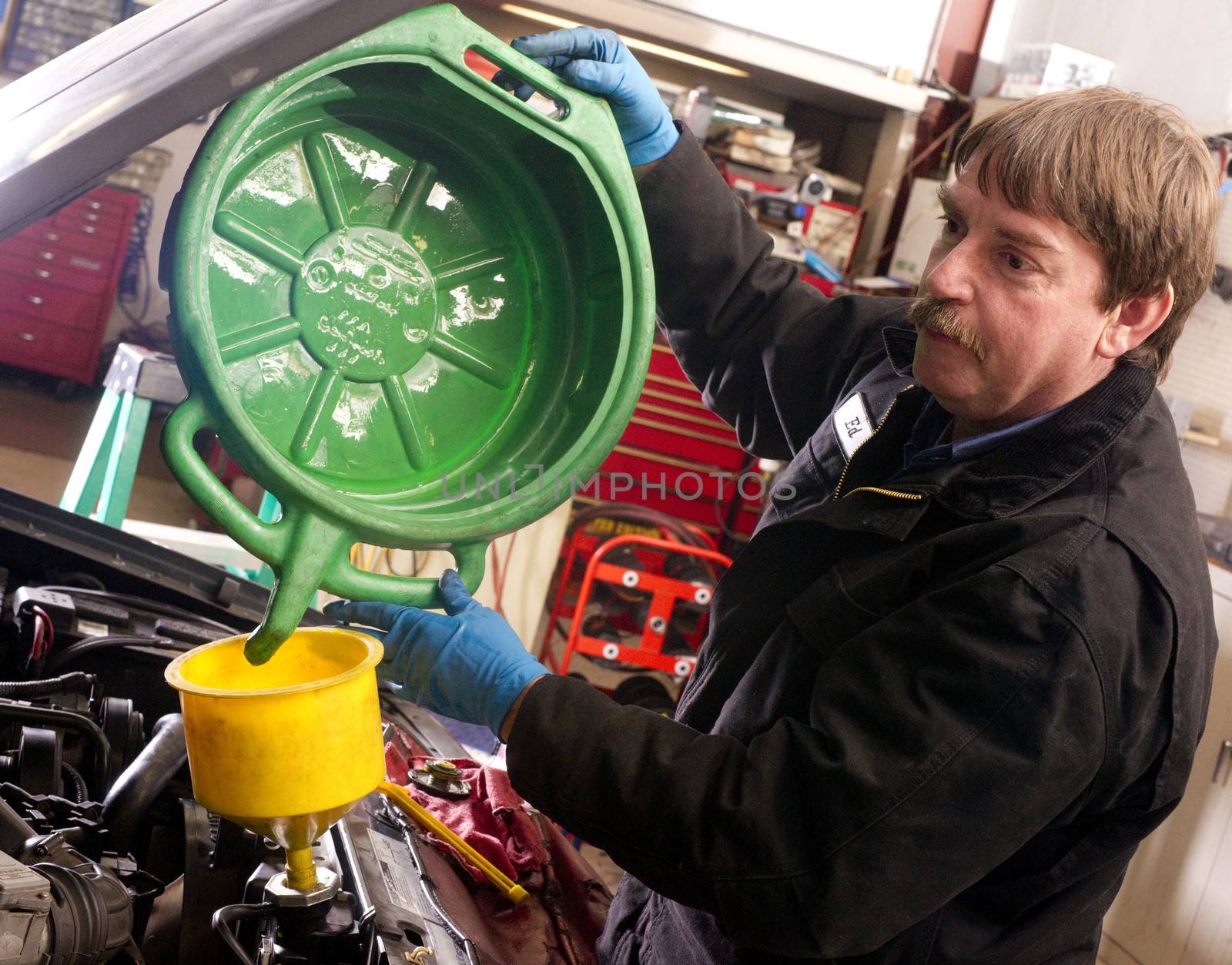 Automotive Technician Auto Mechanic Refills Radiator Service by ChrisBoswell