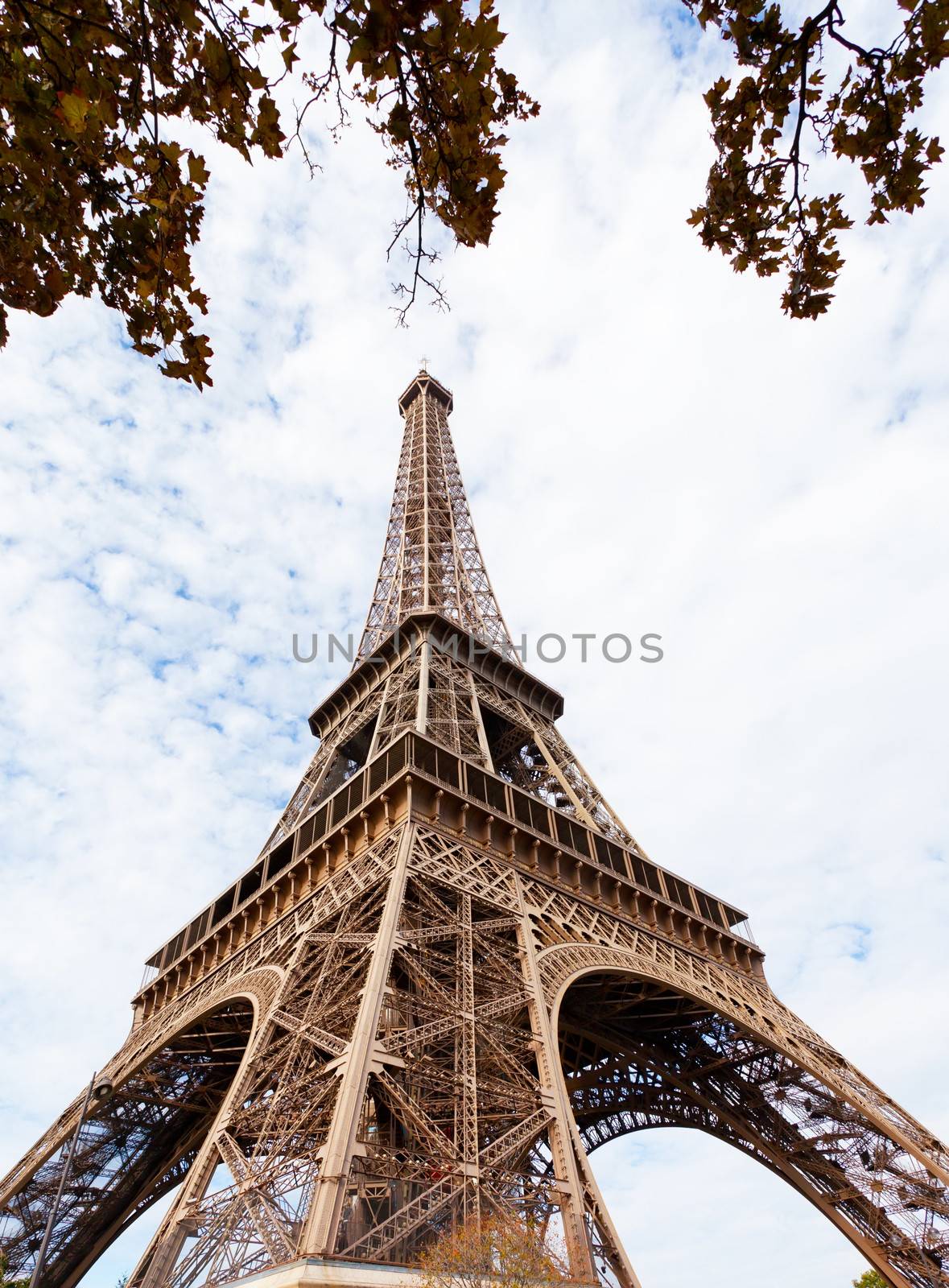 Eiffel Tower against the sky and clouds by elena_shchipkova