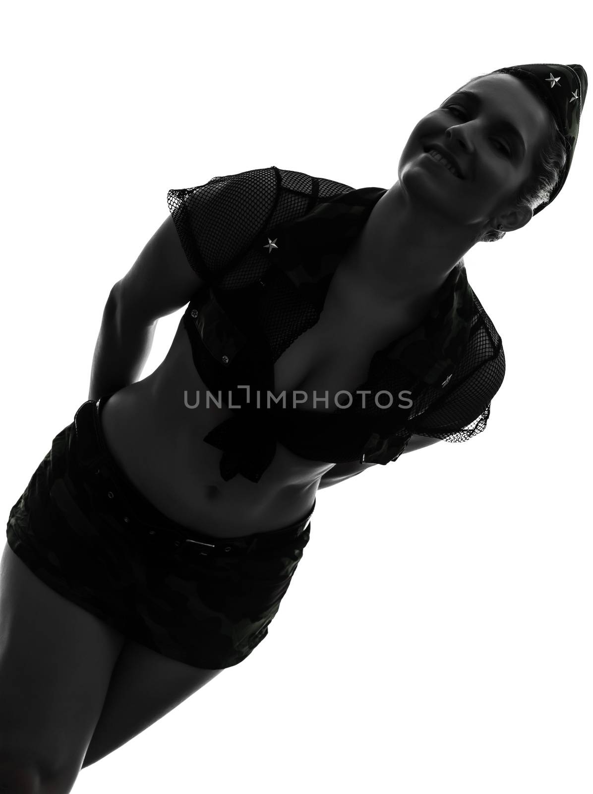one caucasian sexy woman in army uniform portrait in silhouette studio isolated on white background