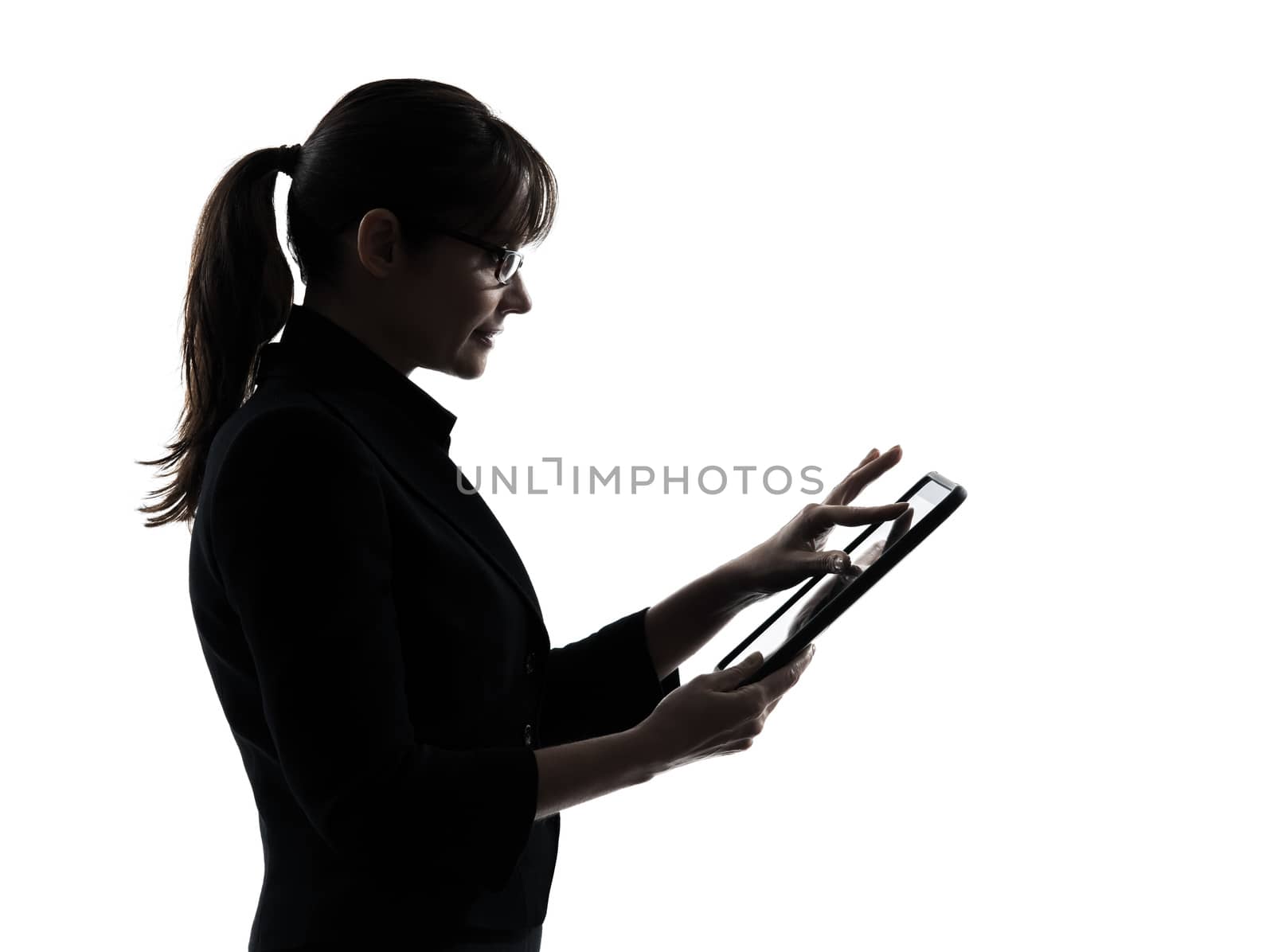 one business woman computer computing typing digital tablet silhouette studio isolated on white background