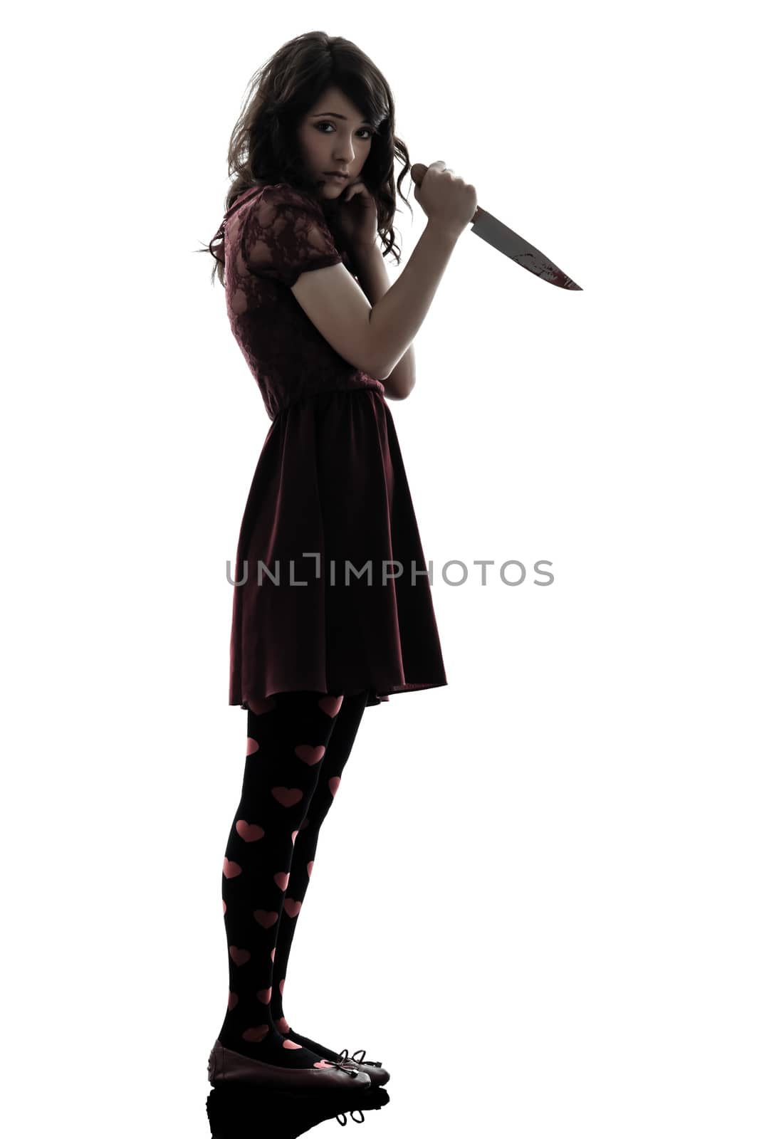 one caucasian strange young woman killer holding bloody knife in silhouette white background