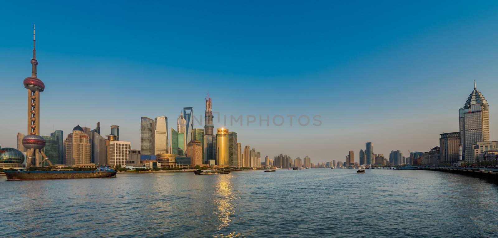 Shanghai, China - April 7, 2013: pudong and the bund on hangpu river shanghai china at the city of Shanghai in China on april 7th, 2013
