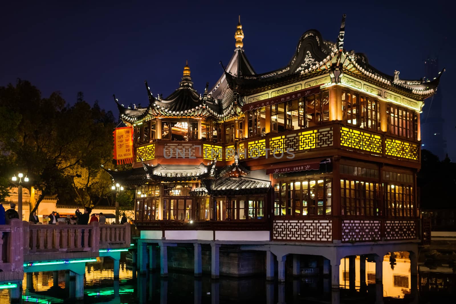 Shanghai, China - April 7, 2013: ancient tea house Fang Bang Zhong Lu old city at night in the city of Shanghai in China on april 7th, 2013