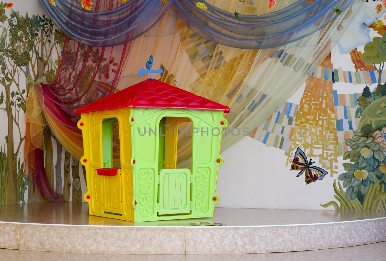 Isolated plastic children's playhouse on beautifully designed st by pt-home