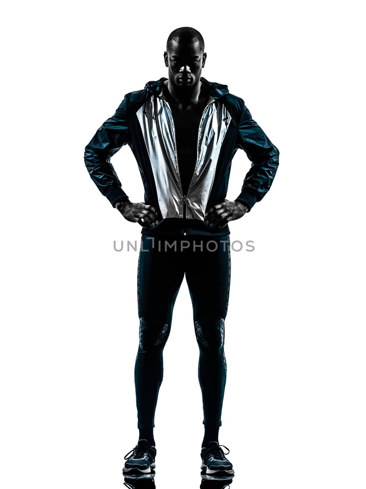 one african man runner sprinter jogger standing posing in silhouette studio isolated on white background