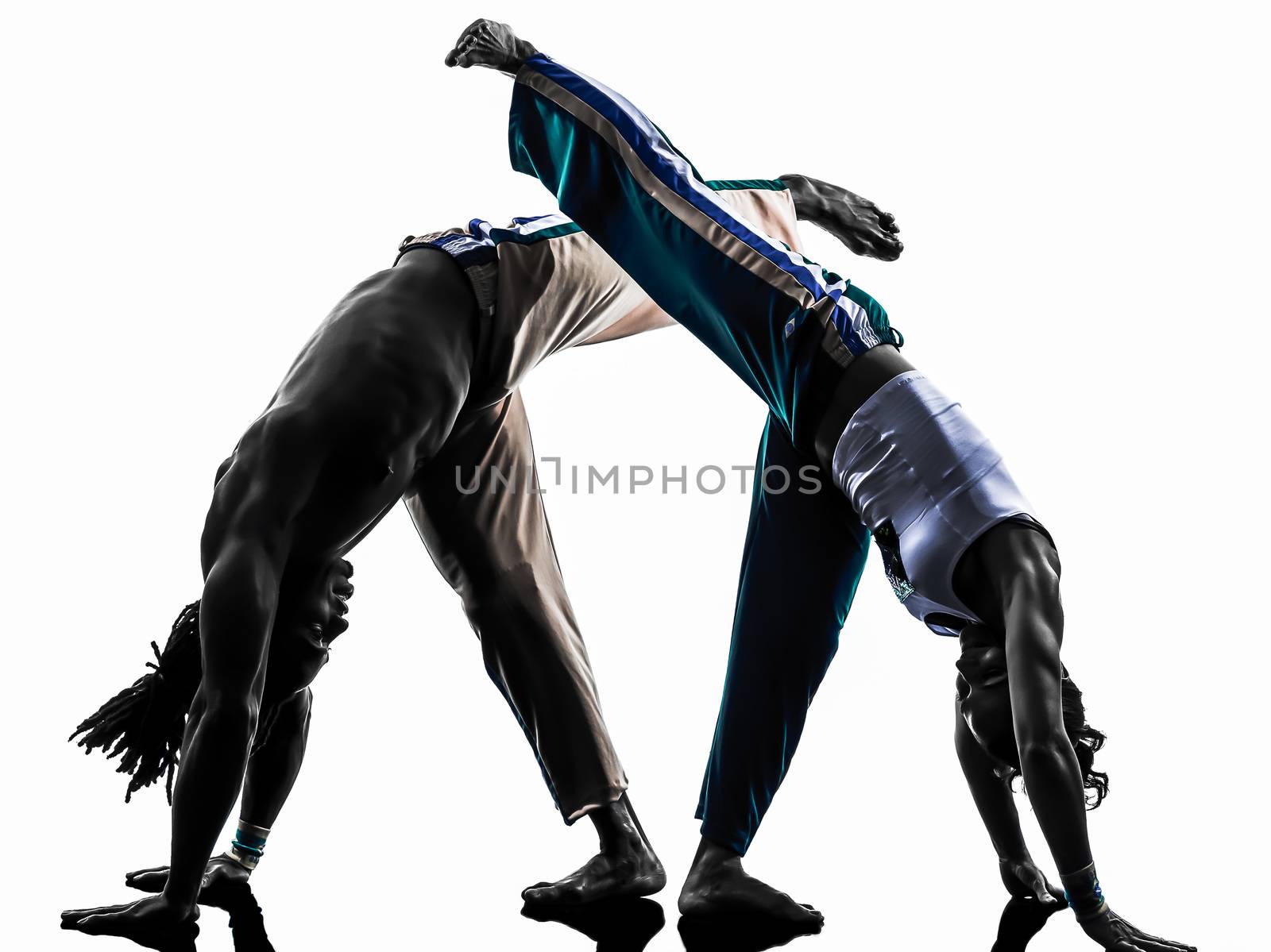 couple capoeira dancers dancing   silhouette  by PIXSTILL