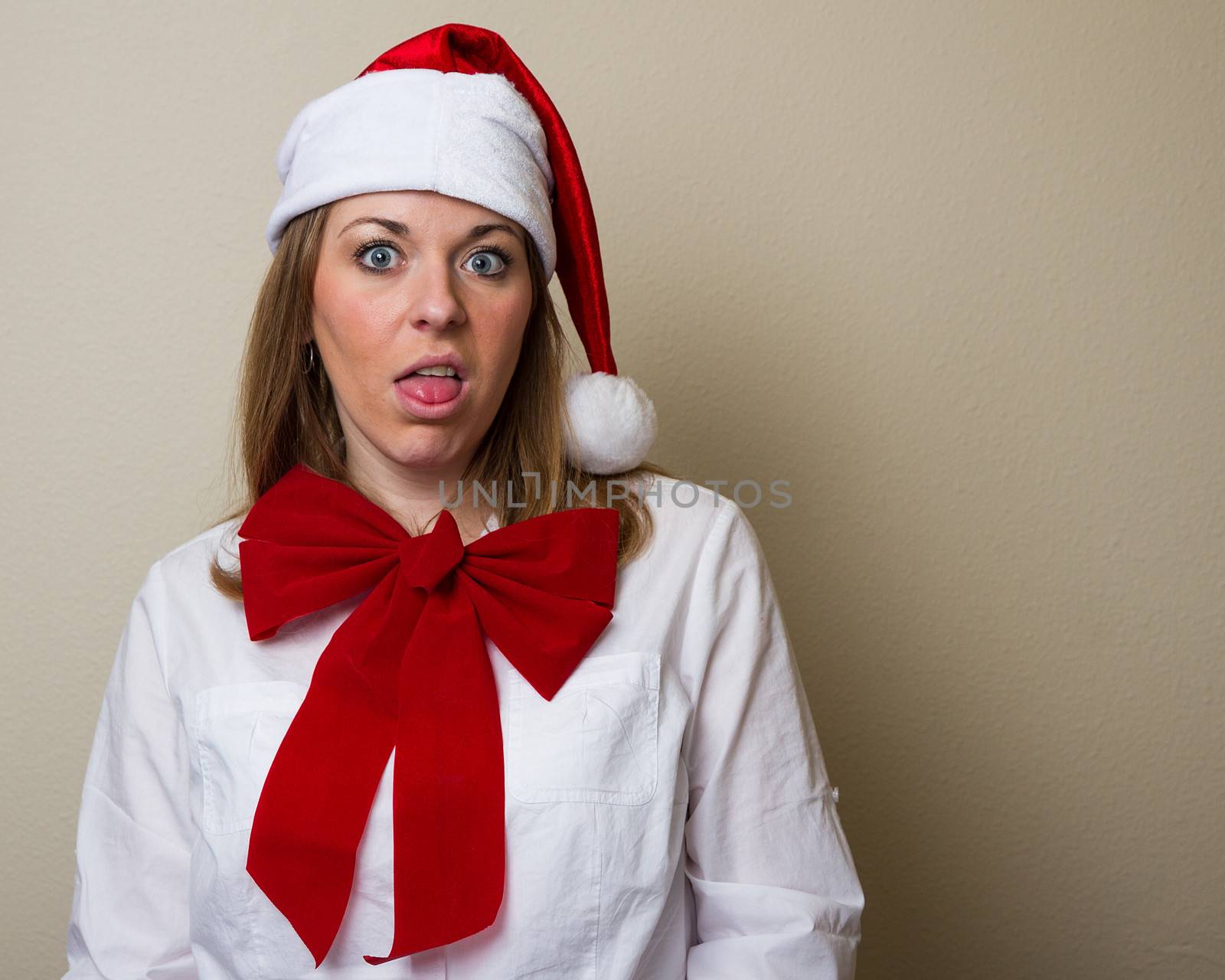 Woman doesn't look happy with the christmas and seems to lack the christmas spirit