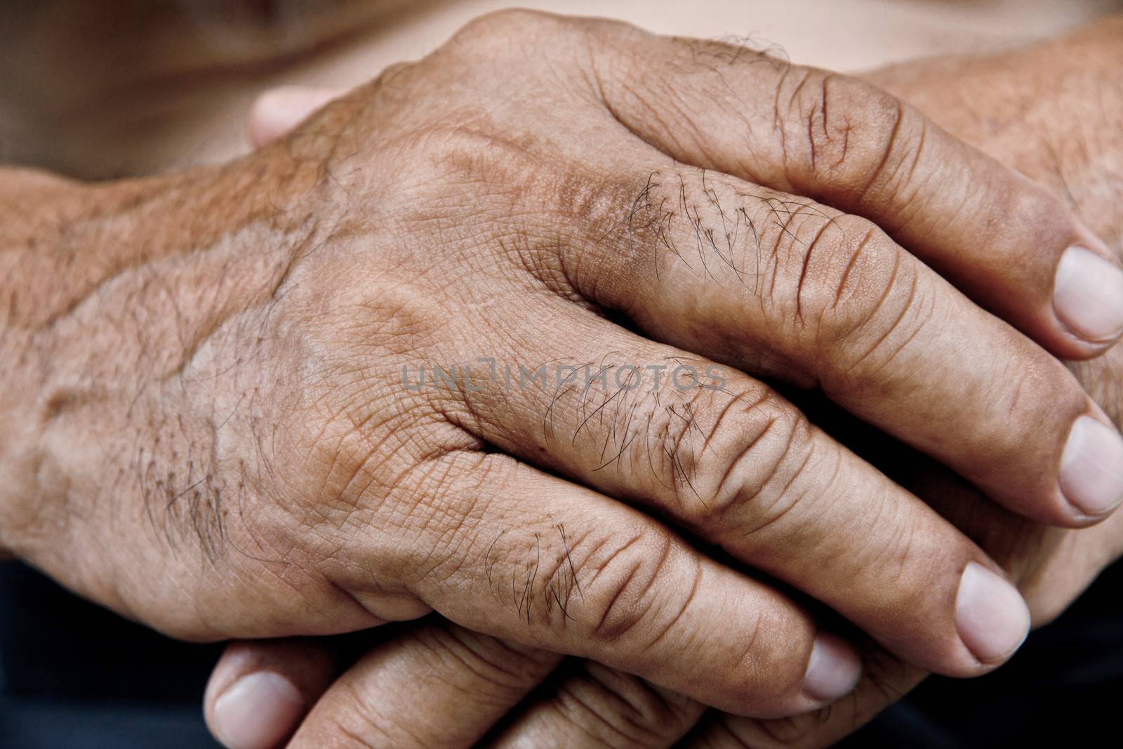close up of old man hand by ponsulak