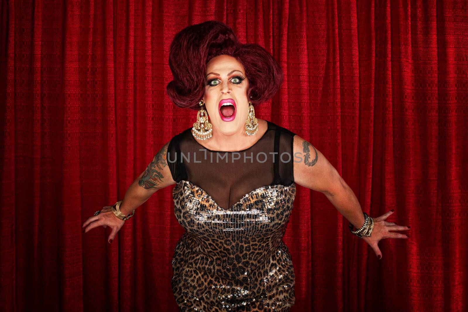 Drag queen screaming or singing in theater