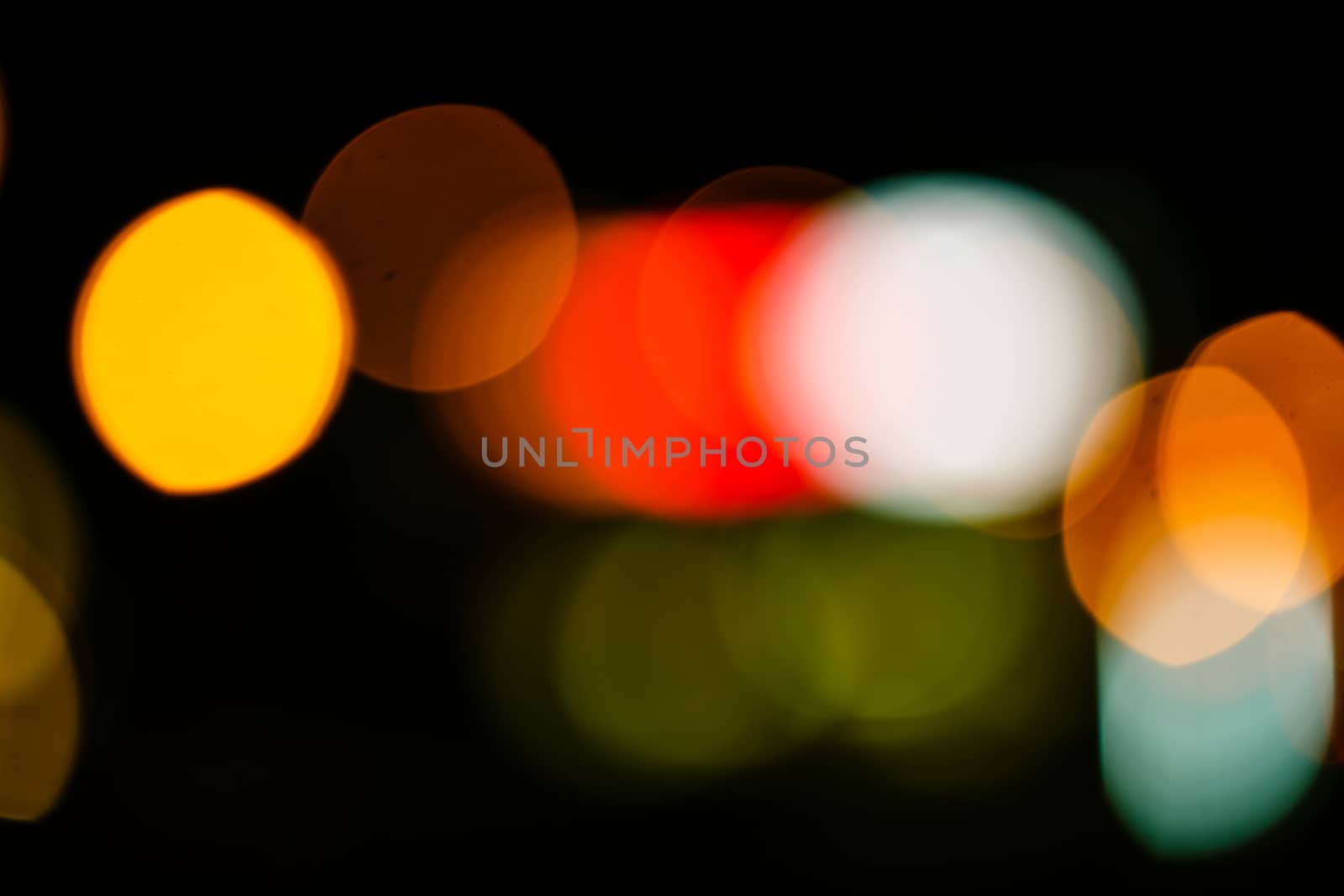 Abstract defocused lights of the night city bokeh background