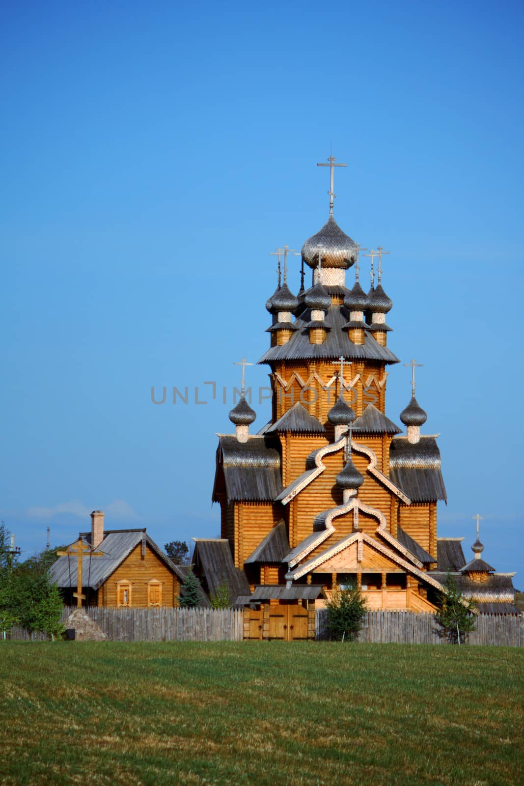 Wooden church in a village by dedmorozz