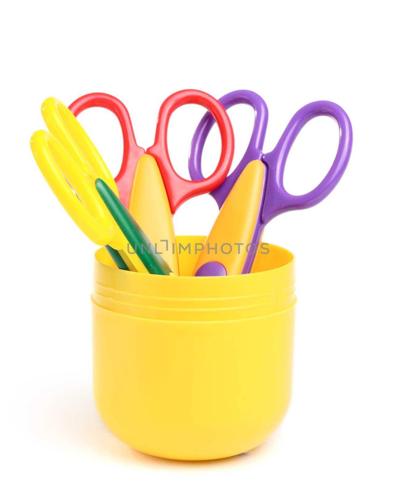 Some scissors in the container isolated on the white background