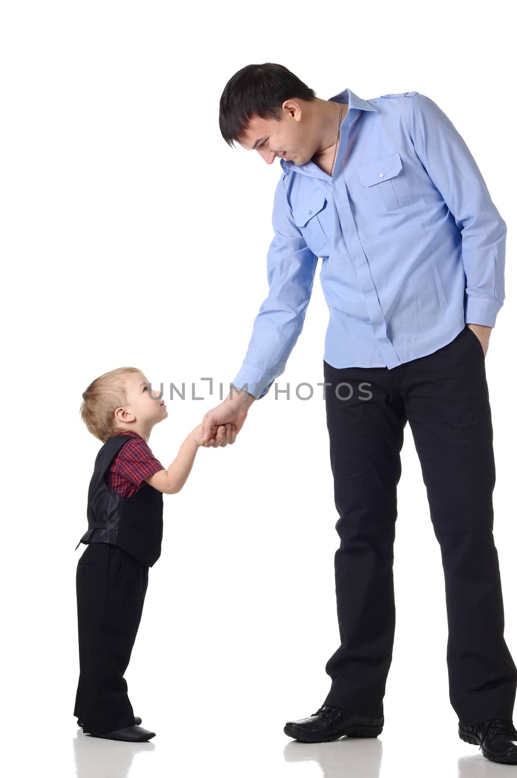 Man and little boy shake hands isolated on the white