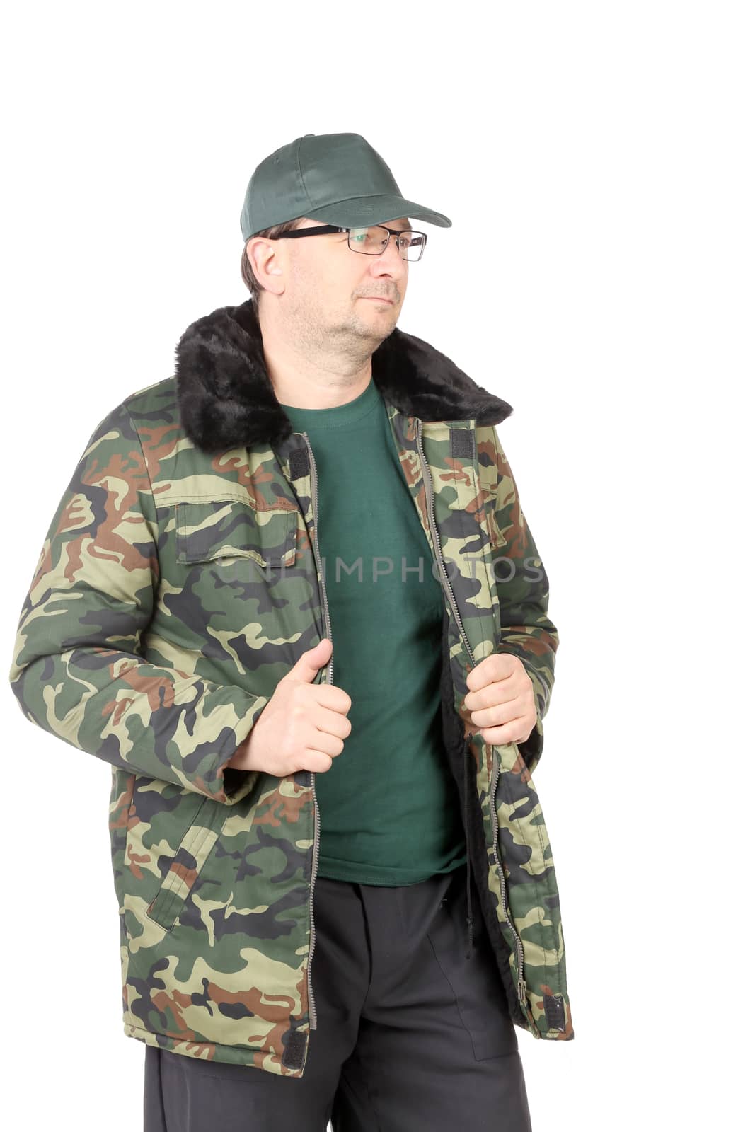 Working man in military workwear. Isolated on a white background.