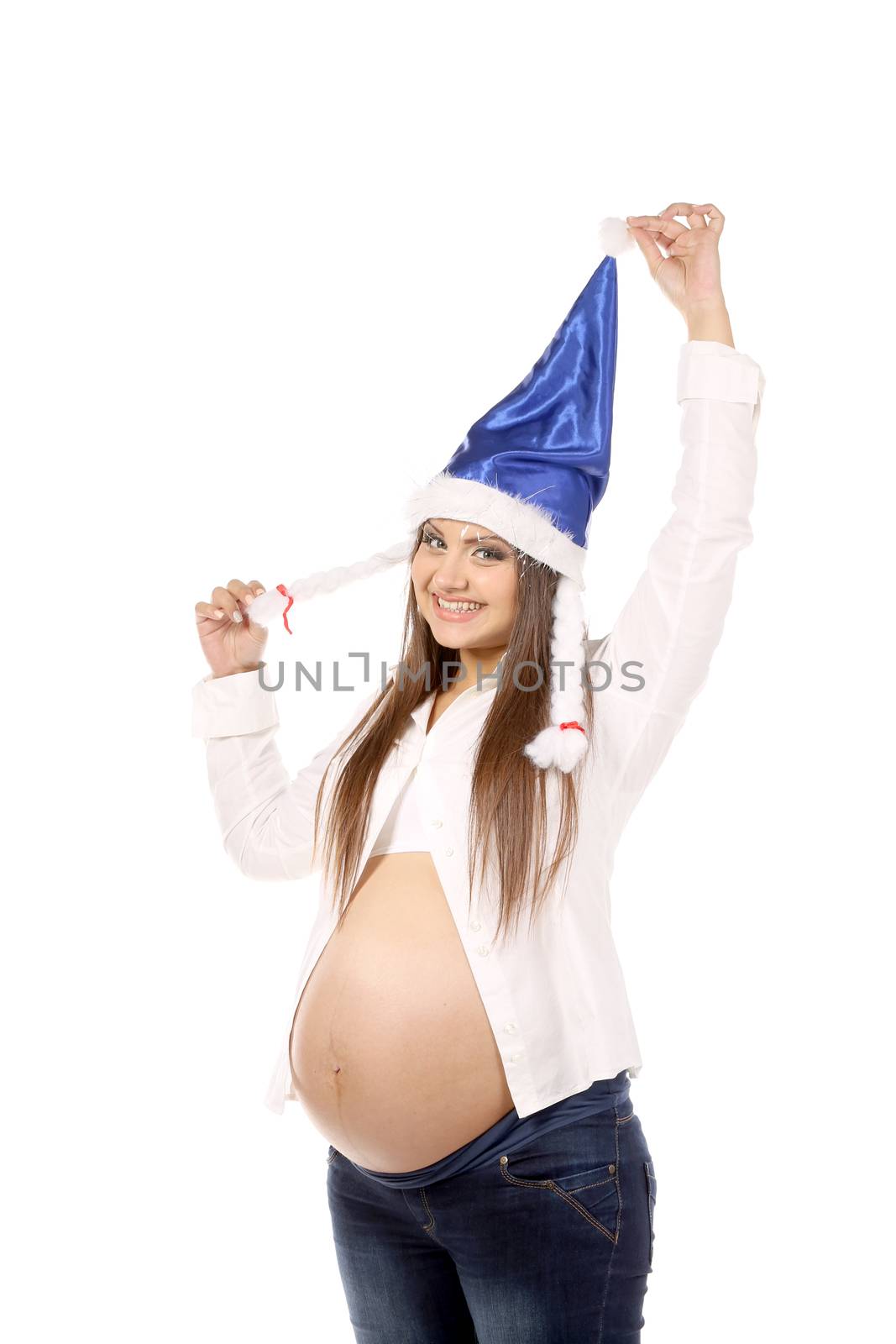 Young pregnant in santas hat. Isolated on a white background.